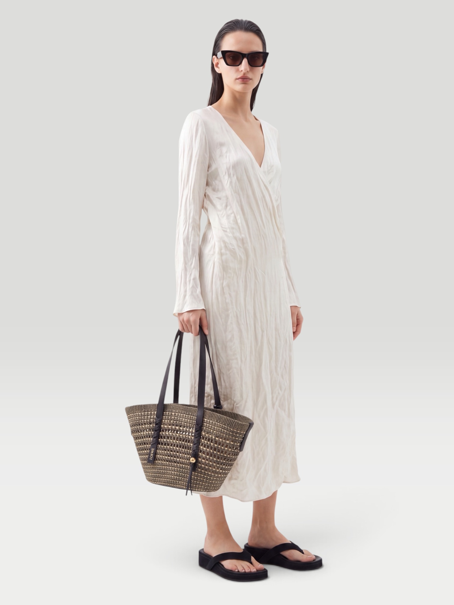 Khaite Rommi Crinkled-Voile Midi Wrap Dress in off-white. Styled by Sharon Lombardo for FDV Concierge.