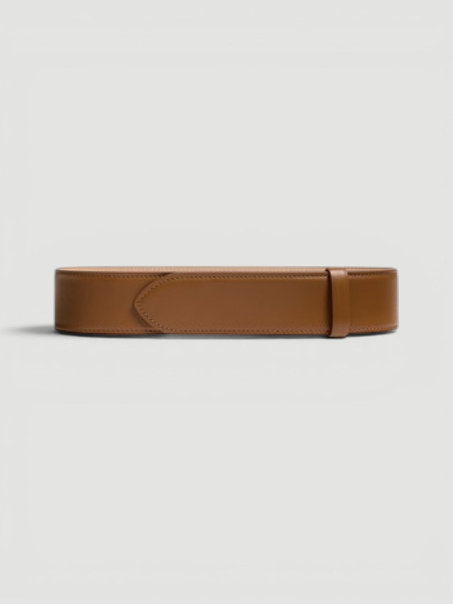 Khaite Theo Leather Belt in brown.