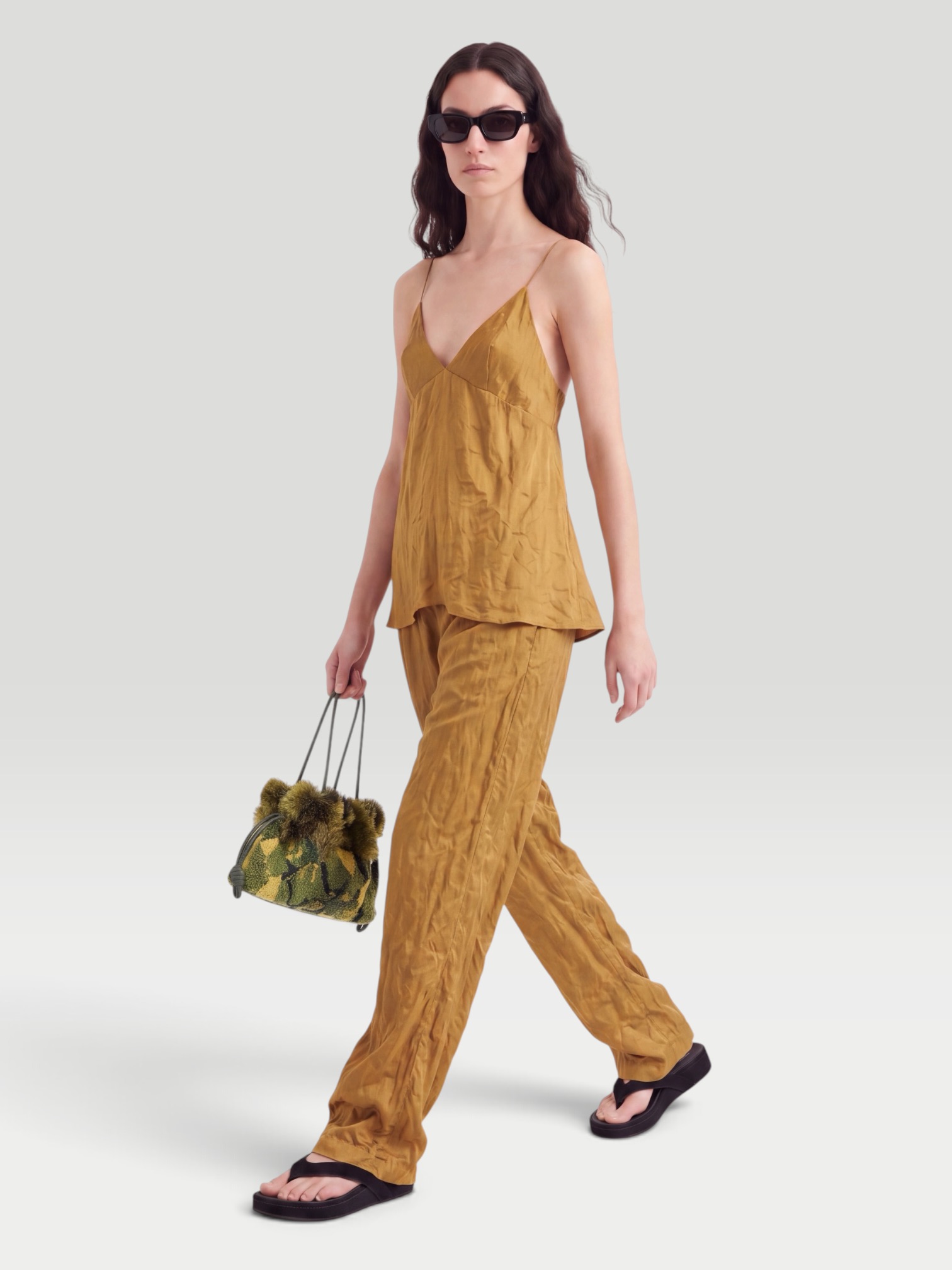 Khaite Timy Crinkled-Voile Camisole in gold. Styled by Sharon Lombardo for FDV Concierge.