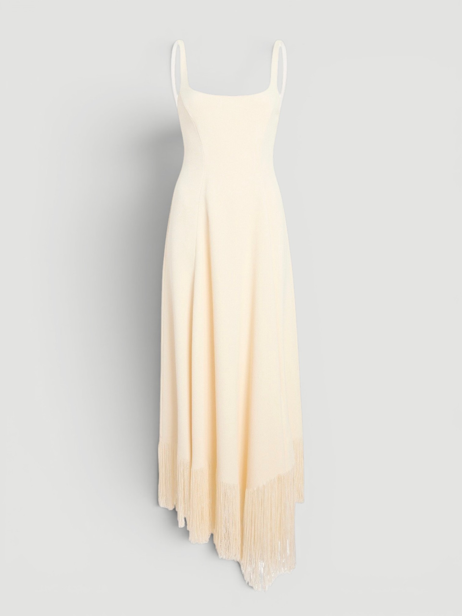 Khaite Vivian Fringed Crepe Maxi Dress in white. Styled by Sharon Lombardo for FDV Concierge.