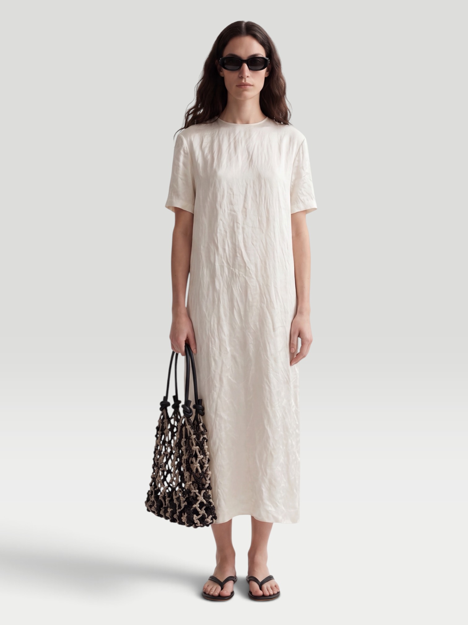 Khaite Webber Crinkled-Voile Midi Dress in white. Styled by Sharon Lombardo for FDV Concierge.