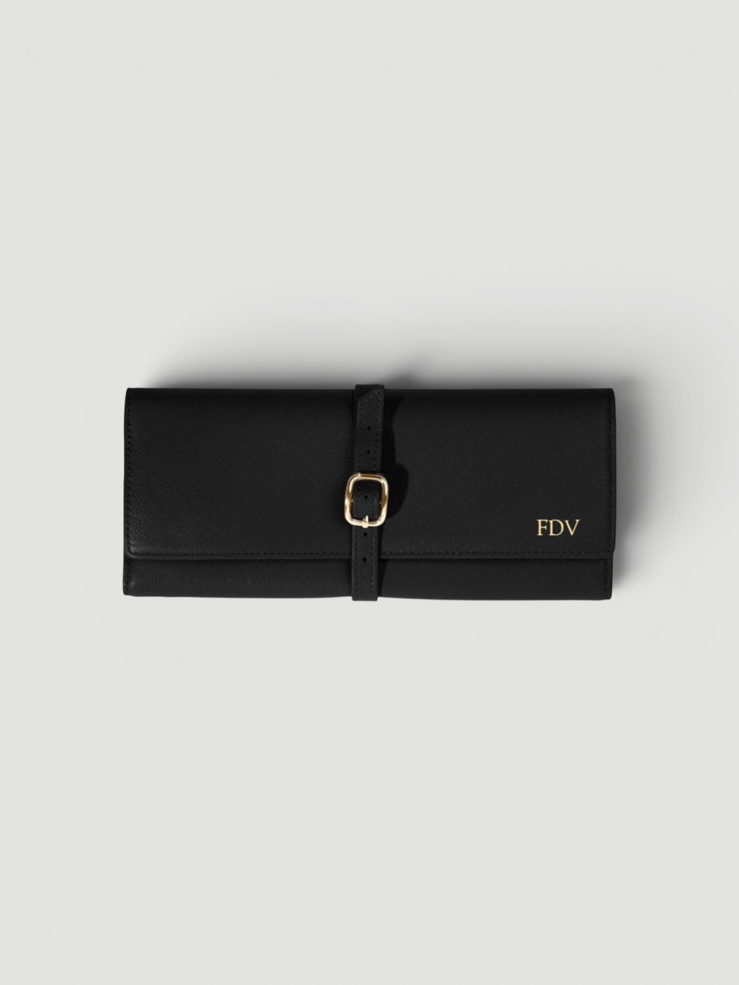 Leatherology Buckled Jewelry Roll in black.
