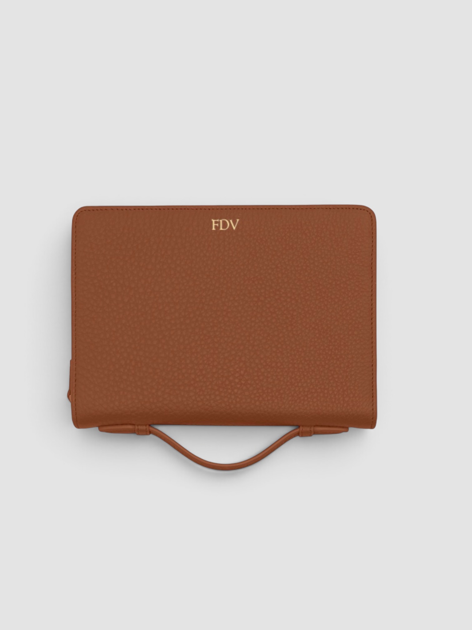 Leatherology Family Passport Holder in saddle brown.