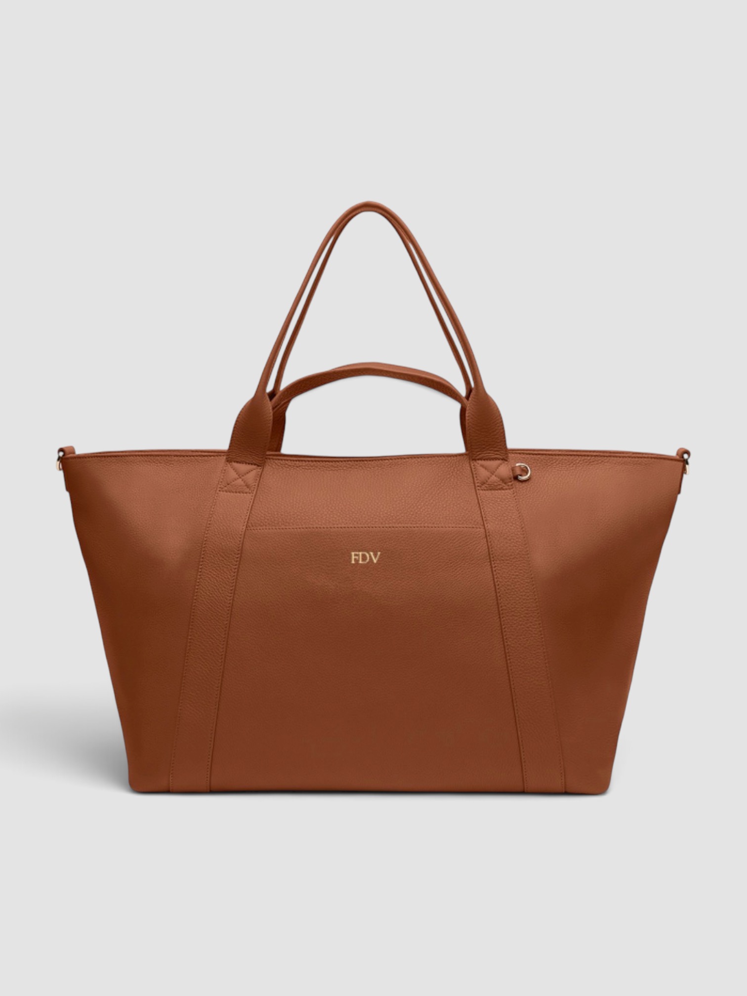 Leatherology Transit Travel Tote in saddle brown.