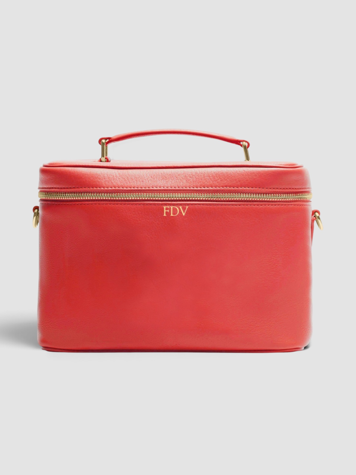 Leatherology XL Train Case in red.