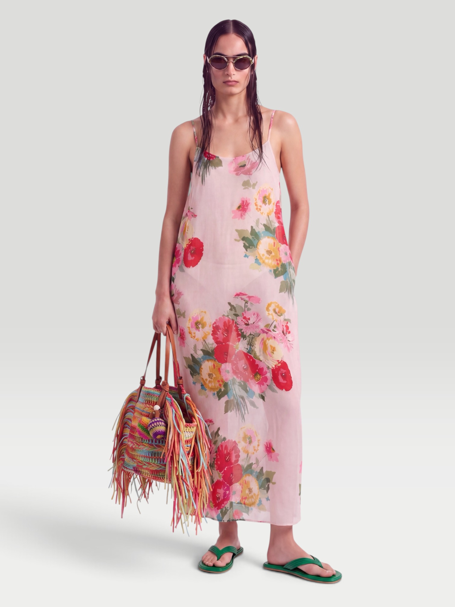 Libertine Pat Nixon Floral Overlay Slip Dress in cream multi, worn with Bottega Veneta Sampieri Flat Thong, Aquazzura Trancoso Fringed Raffia Tote Bag, Dries Van Noten Oval Sunglasses, Etro Crystal-Embellished Faux-Pearl Hoop Earrings, the day. Styled by Sharon Lombardo for FDV Concierge.