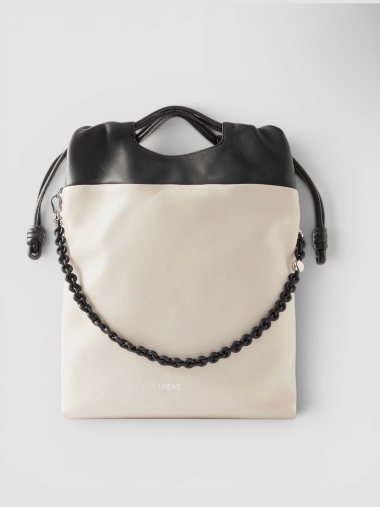 Loewe Flamenco Two Tone Bag in black/cream, worn with Bouguessa Nadia Kaftan, Prada Patent Leather Thong Sandals. Styled by Sharon Lombardo for FDV Concierge.