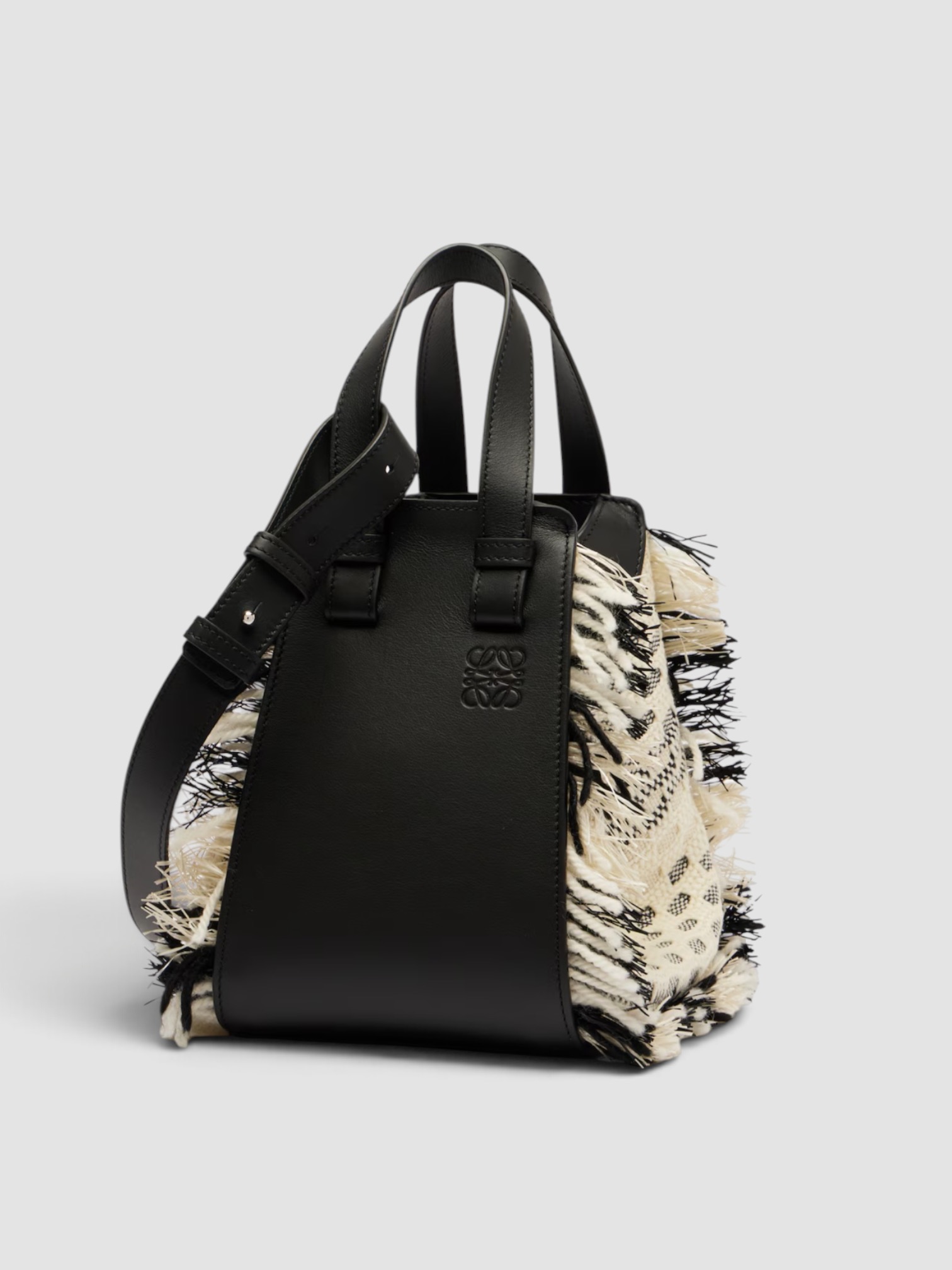 Loewe Hammock Compact Leather Top-Handle Bag in black/white, worn with St. Agni Relaxed Tee Dress. Styled by Sharon Lombardo for FDV Concierge.