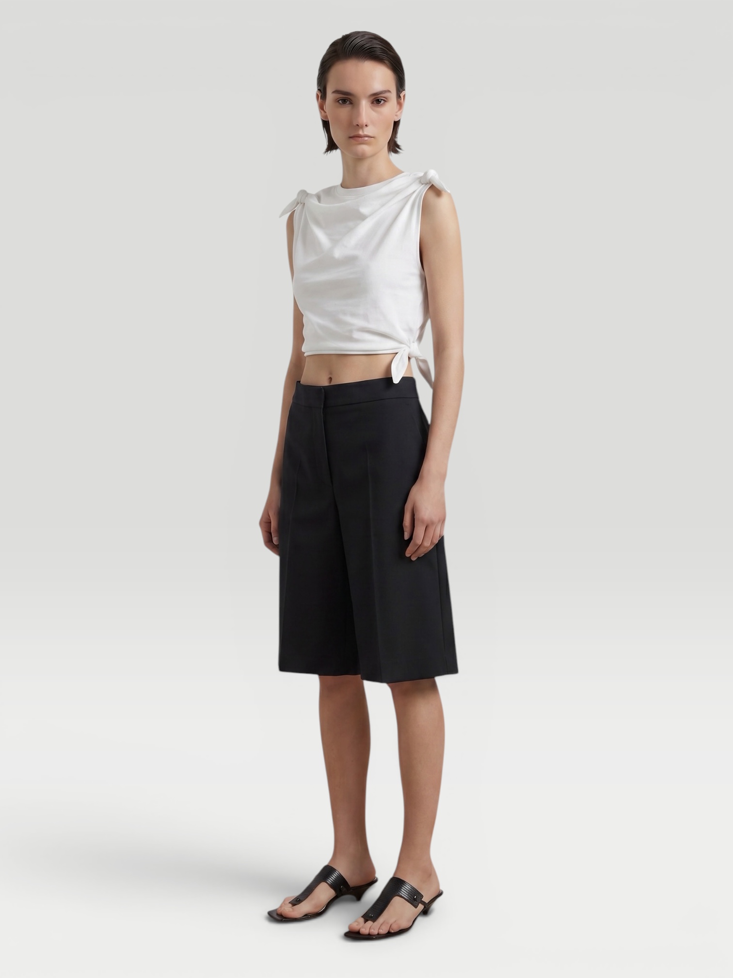 Loewe Paula's Ibiza Knot-Tie Cotton-Blend Jersey Crop Blouse in ivory.