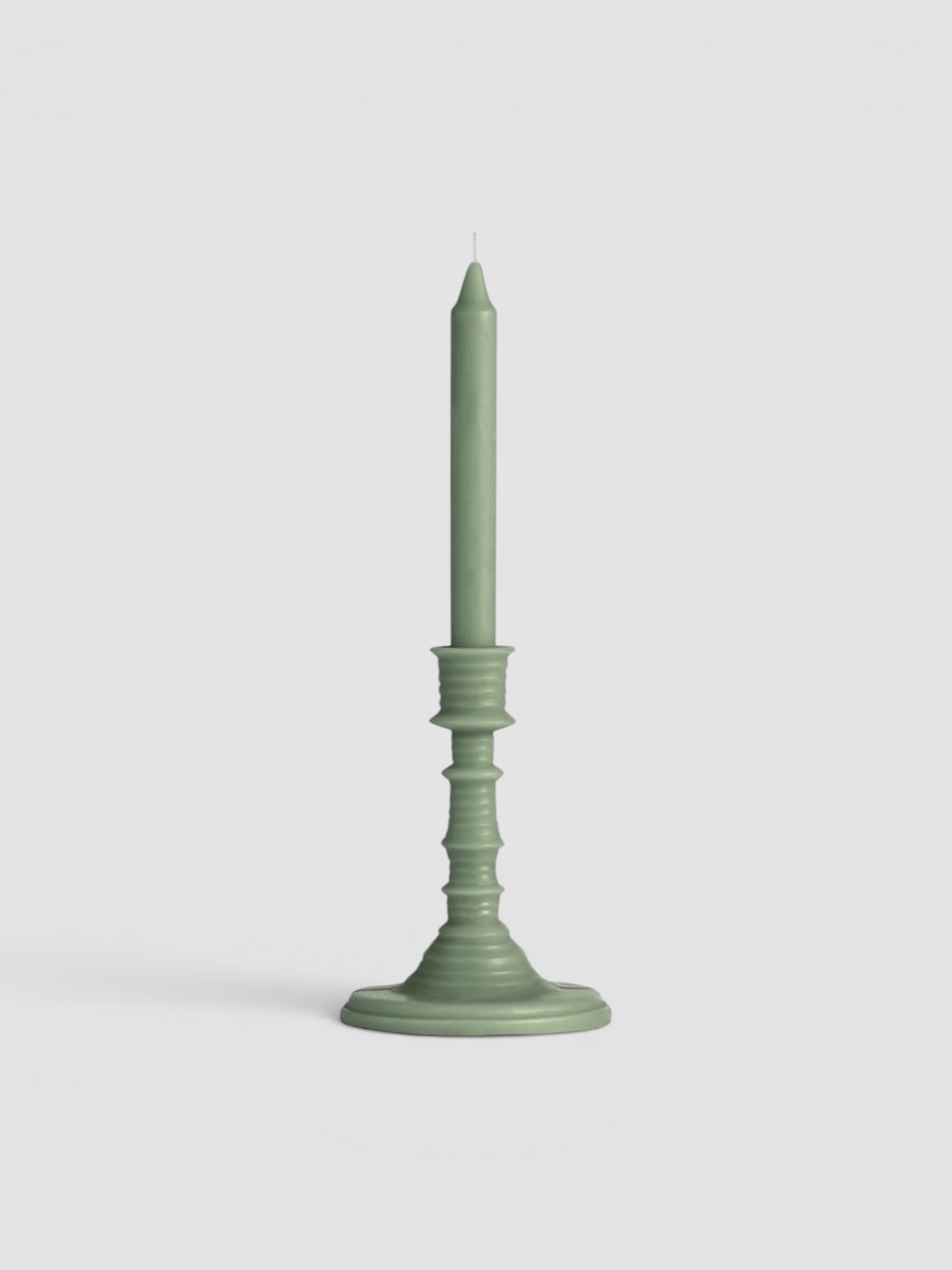 Loewe Scent of Marihuana Wax Candleholder in green.