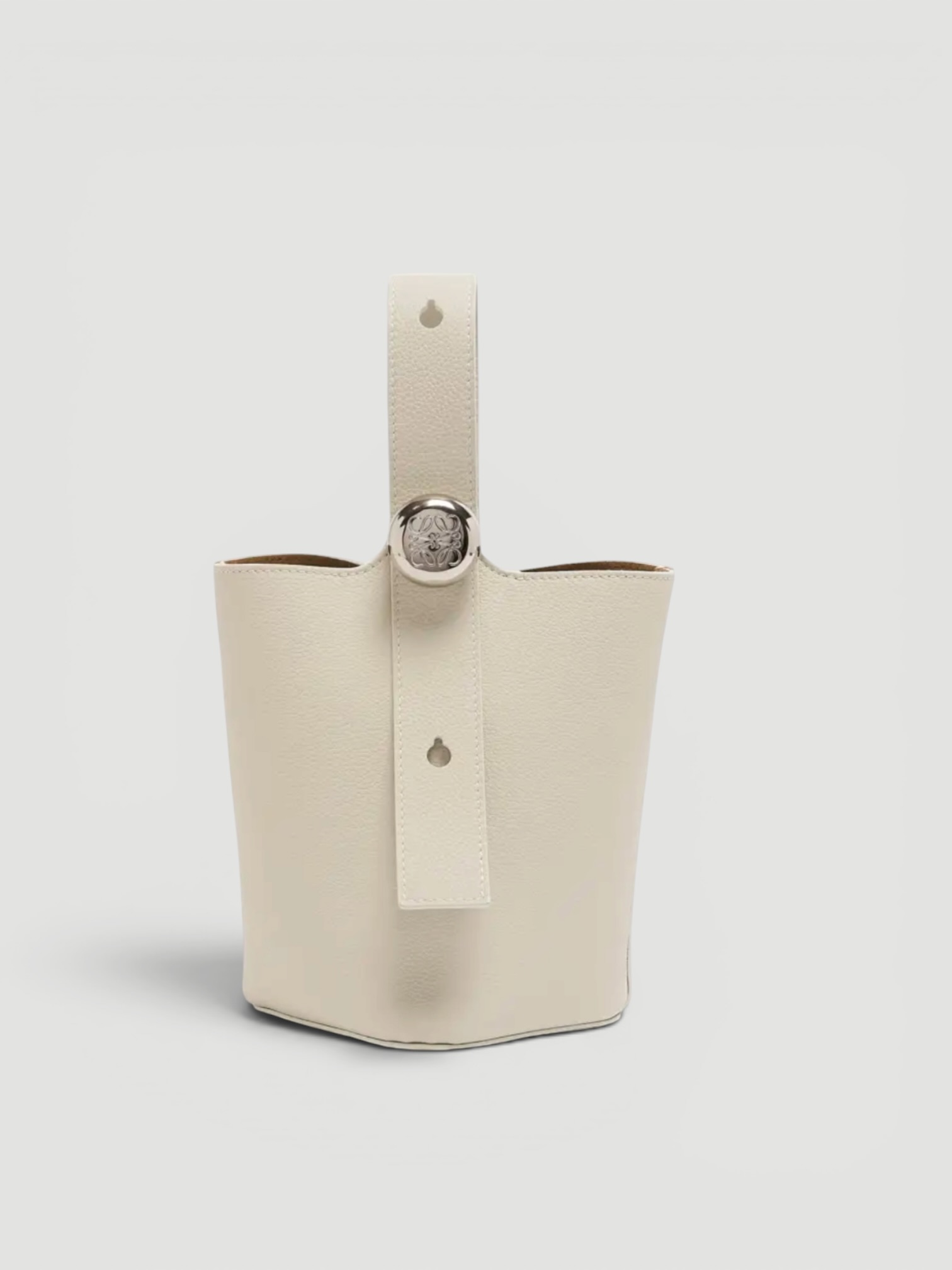 Loewe Mini Pebble Leather Bucket Bag in soft white, worn with HEIRLOME Monica Dress. Styled by Sharon Lombardo for FDV Concierge.