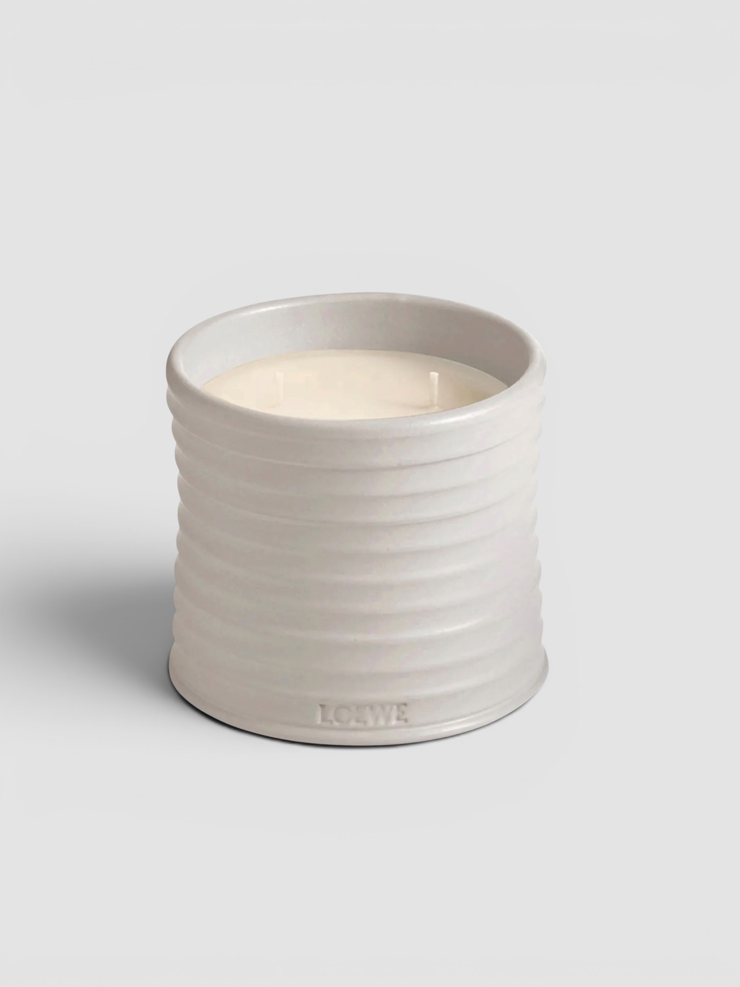 Loewe Oregano Candle in green.