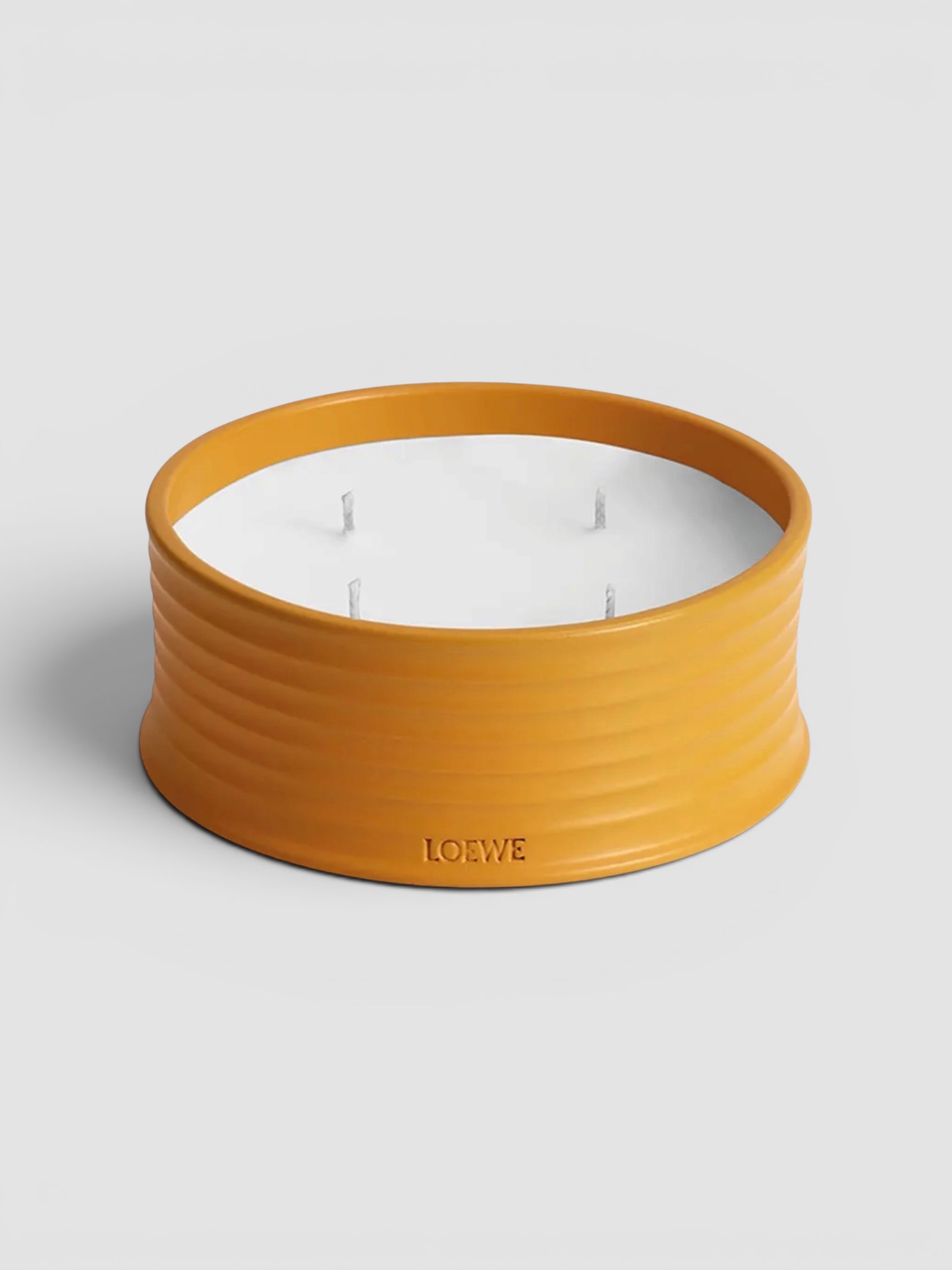 Loewe Outdoor Candle Ginger in ginger.