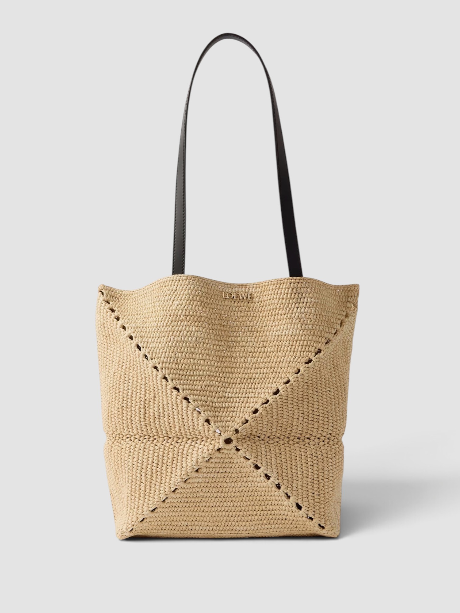 Loewe Paula's Ibiza Puzzle Fold Medium Leather-Trimmed Raffia Tote in beige, worn with Totême Striped Shirtdress. Styled by Sharon Lombardo for FDV Concierge.