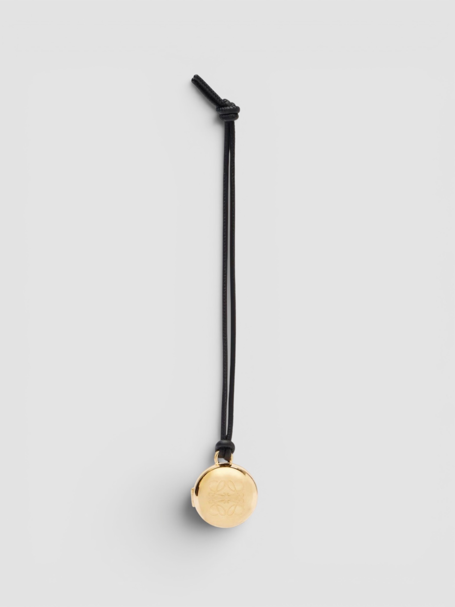 Loewe Pebble Gold-Plated Leather Bag Charm in gold.