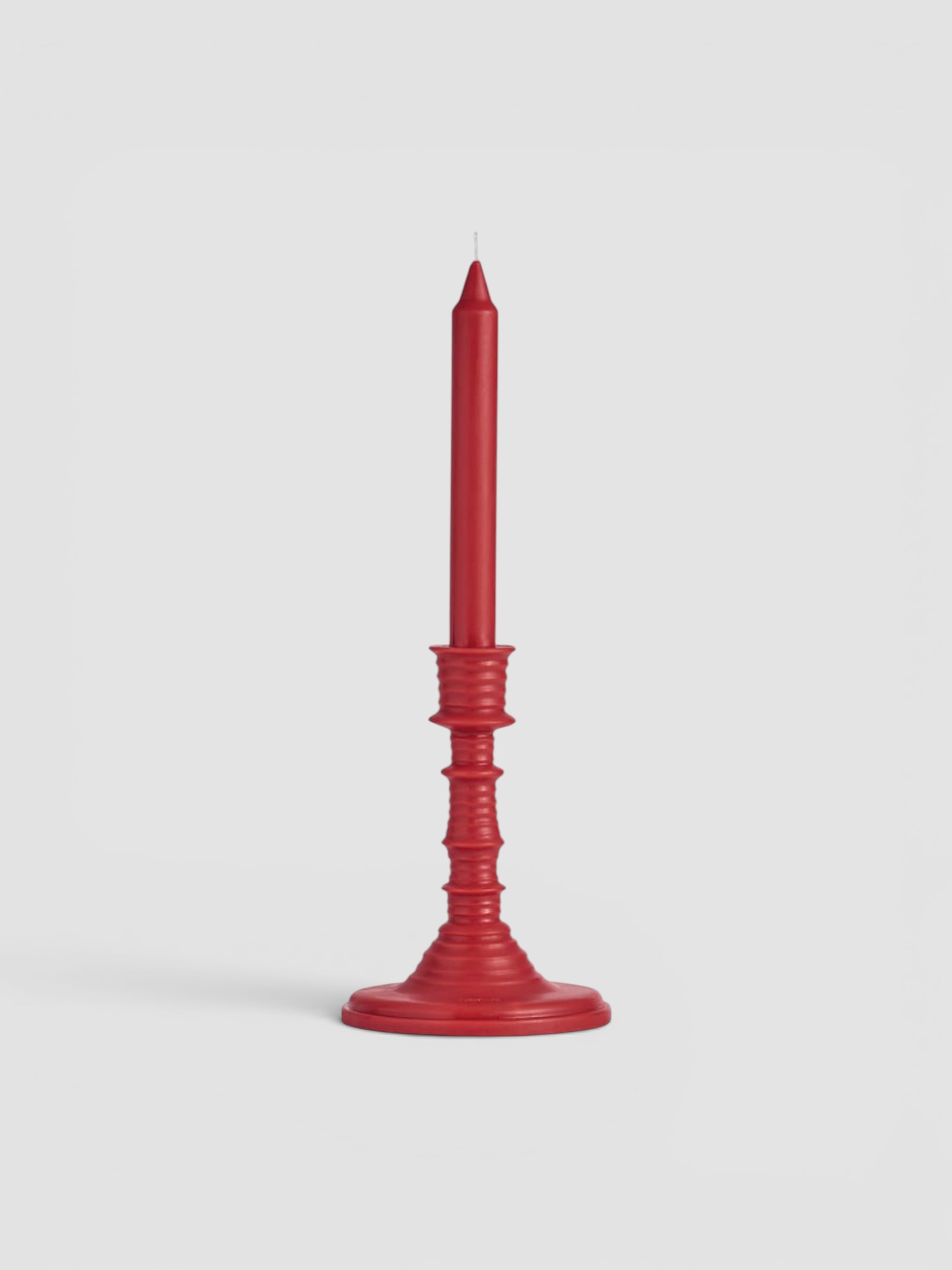 Loewe Tomato Leaves Wax Candleholder in red.