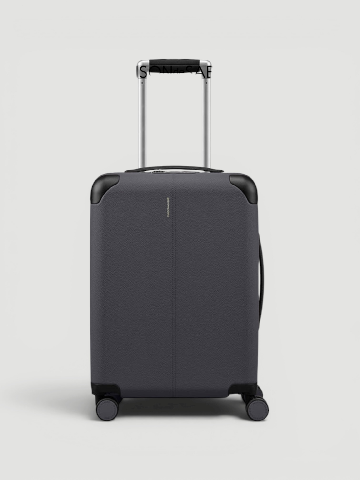 Maison de Sabré The Carry-On Suitcase in dark grey.