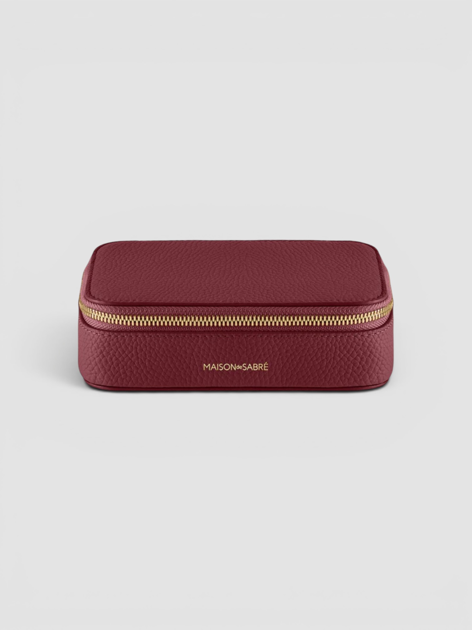Maison de Sabré The Jewellery Case in plum red.