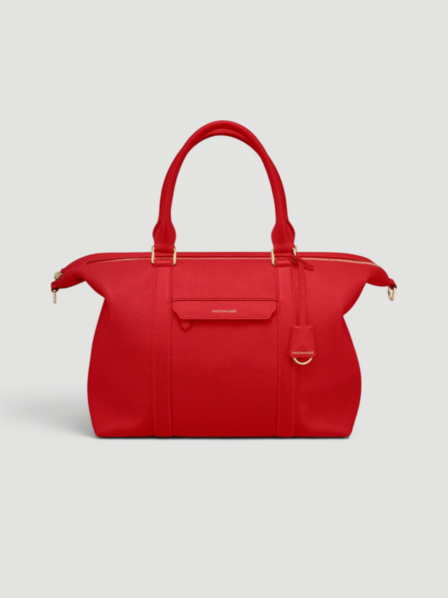 Maison de Sabré The Weekender in pomegranate red.