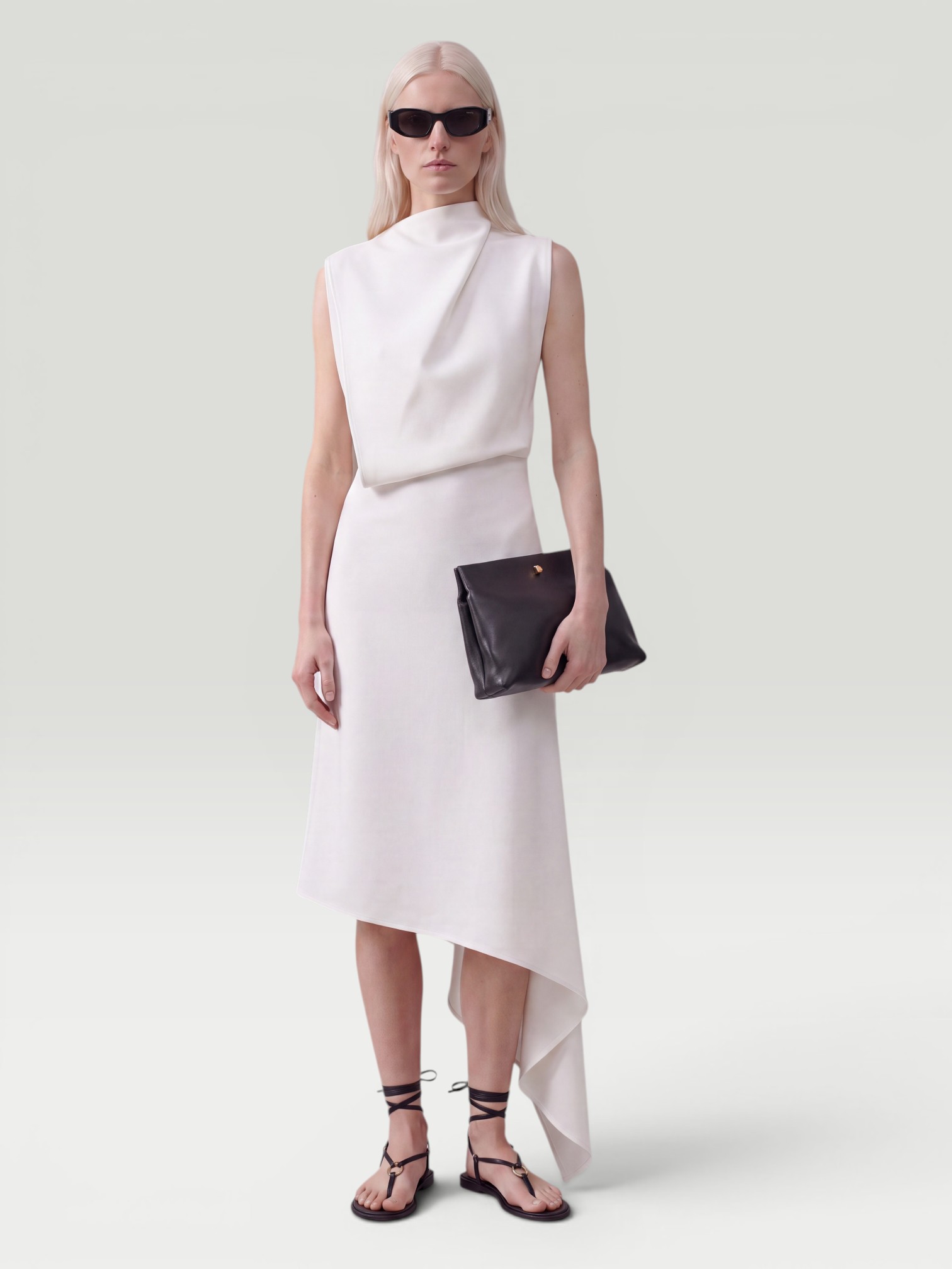 Maticevski Prosper Asymmetric Draped Midi Dress in white. Styled by Sharon Lombardo for FDV Concierge.