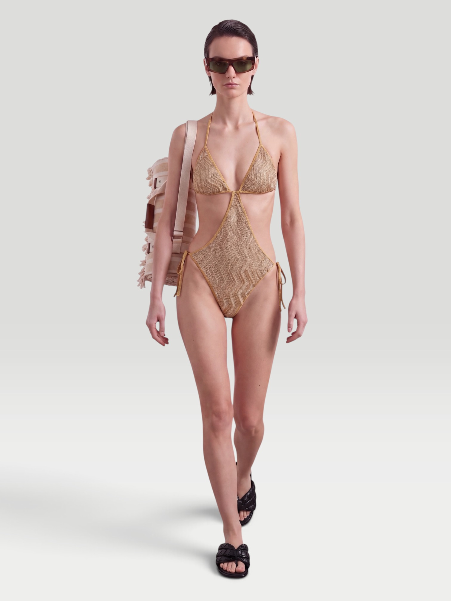 Missoni Mare Cutout Sequin-Embellished Striped Metallic Crochet-Knit Swimsuit in gold. Styled by Sharon Lombardo for FDV Concierge.