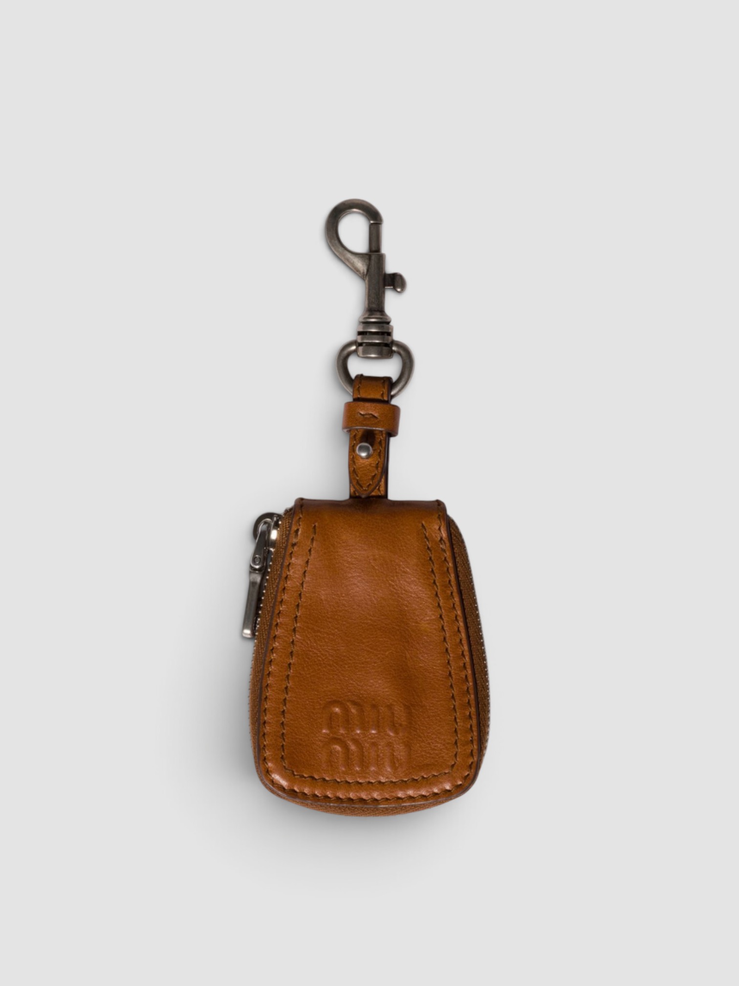 Miu Miu Leather Keyring Trick in cognac.