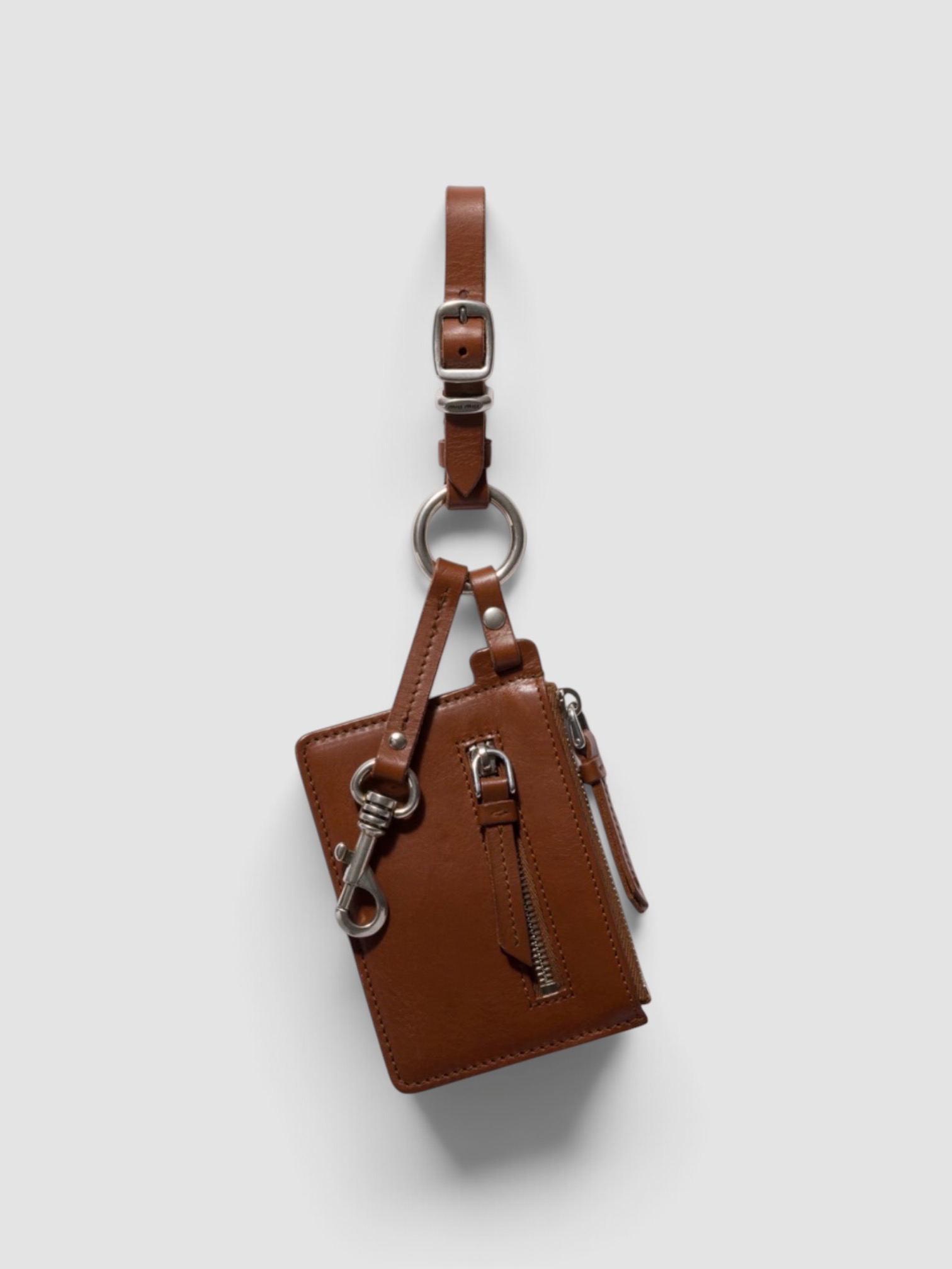 Miu Miu Leather Keyring Trick in tobacco.