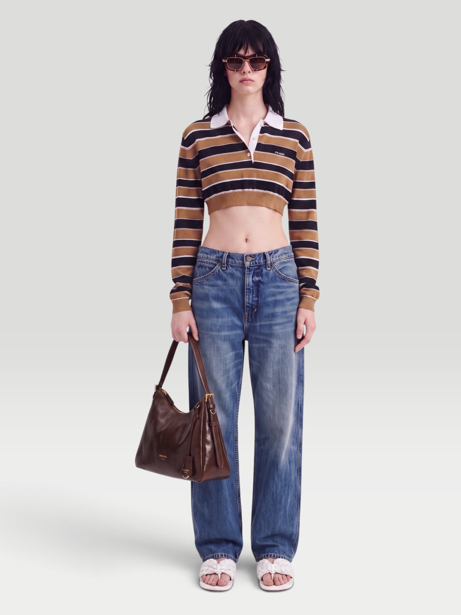 Nili Lotan Tribeca Stretch Mid-Rise Barrel-Leg Jeans in blue. Styled by Sharon Lombardo for FDV Concierge.