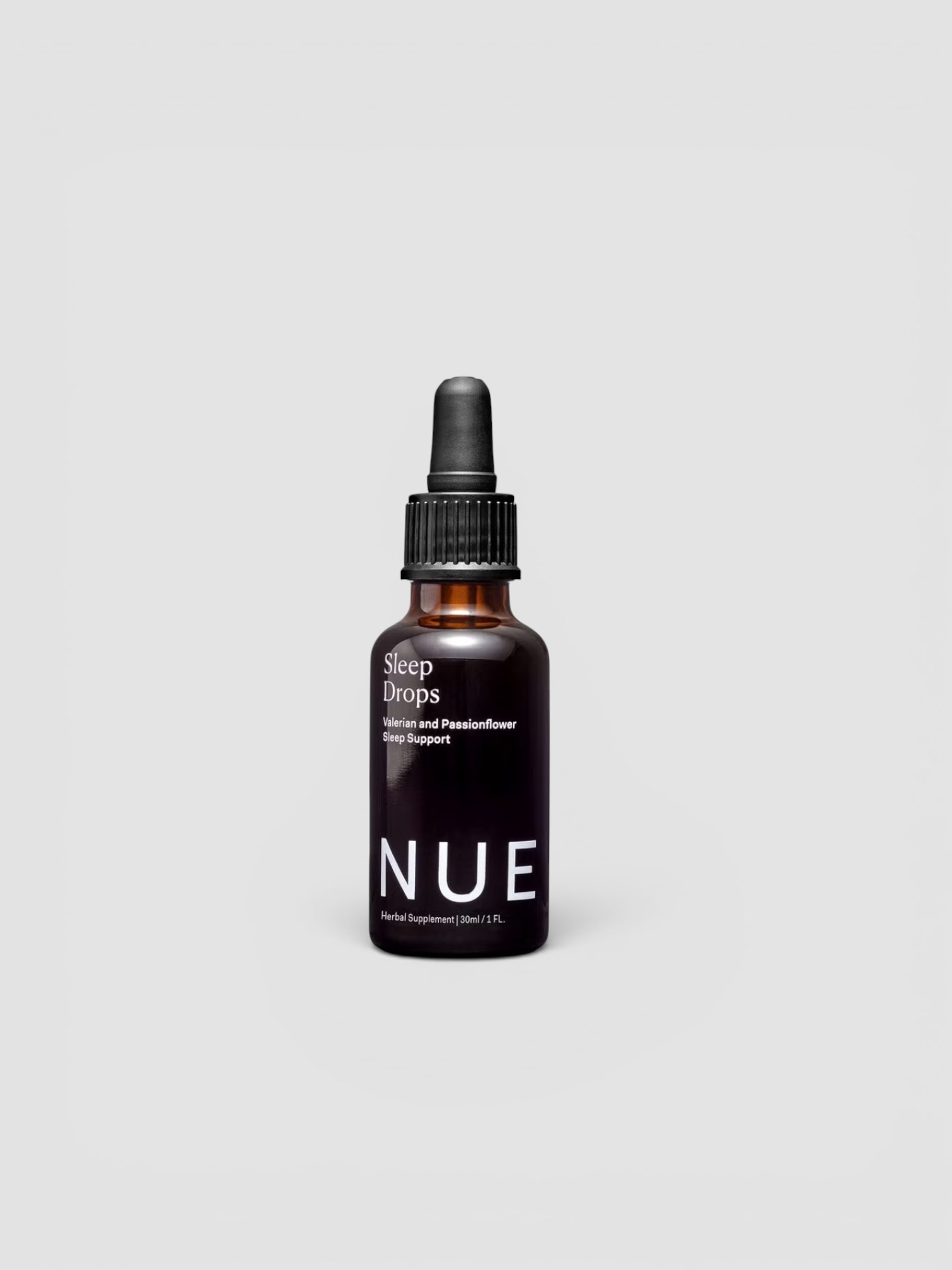 The Nue Co Sleep Drops in amber.