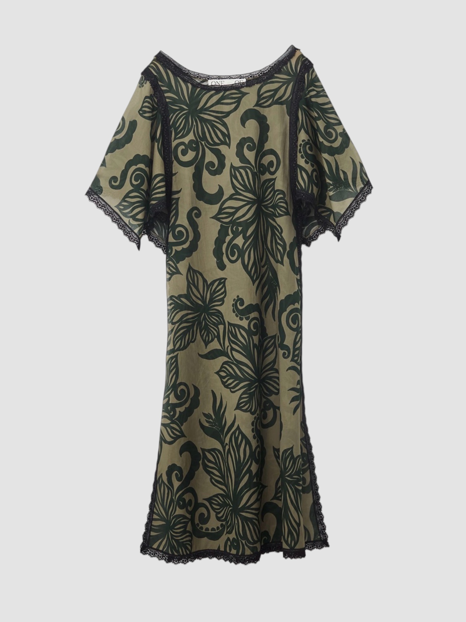 One Of Leandra Caftan in green, worn with Phoebe Philo Small Stud Cabas Tote Bag, Prada Patent Leather Thong Sandals, Bottega Veneta Cat-Eye Acetate Sunglasses, Chan Luu Caprice Crystal Toe Ring, the day. Styled by Sharon Lombardo for FDV Concierge.