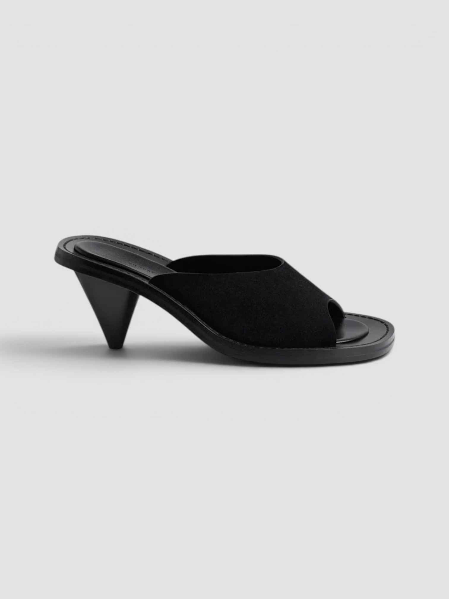 Phoebe Philo Cone Heel Mules in black, worn with St. Agni Soft Jersey Slim Scoop Tank, Phoebe Philo Straight Jeans, Phoebe Philo 25mm Leather Belt, Prada B16SF Acetate Oval Sunglasses, the evening. Styled by Sharon Lombardo for FDV Concierge.