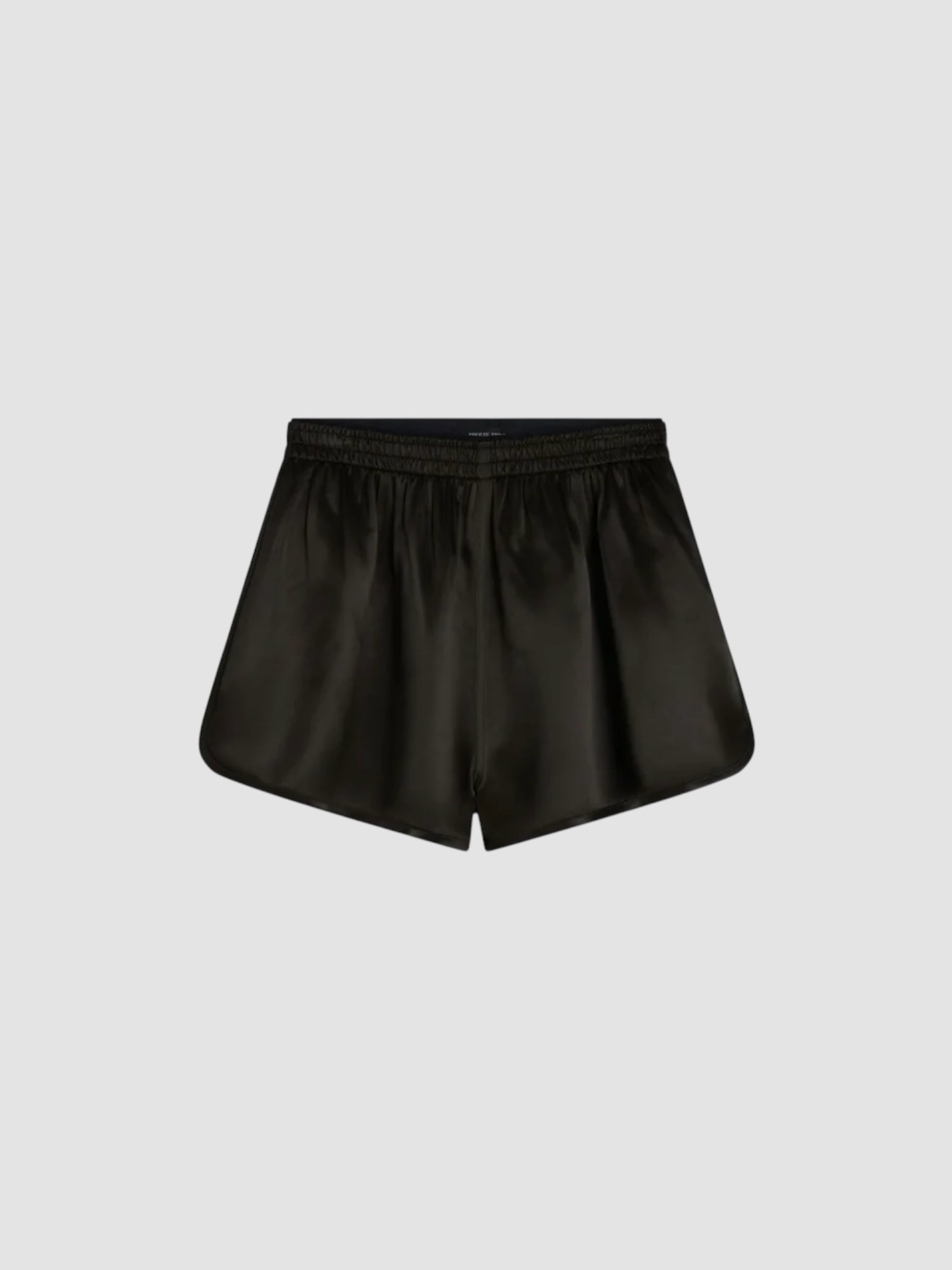 Phoebe Philo Satin Track Shorts in dark green. Styled by Sharon Lombardo for FDV Concierge.