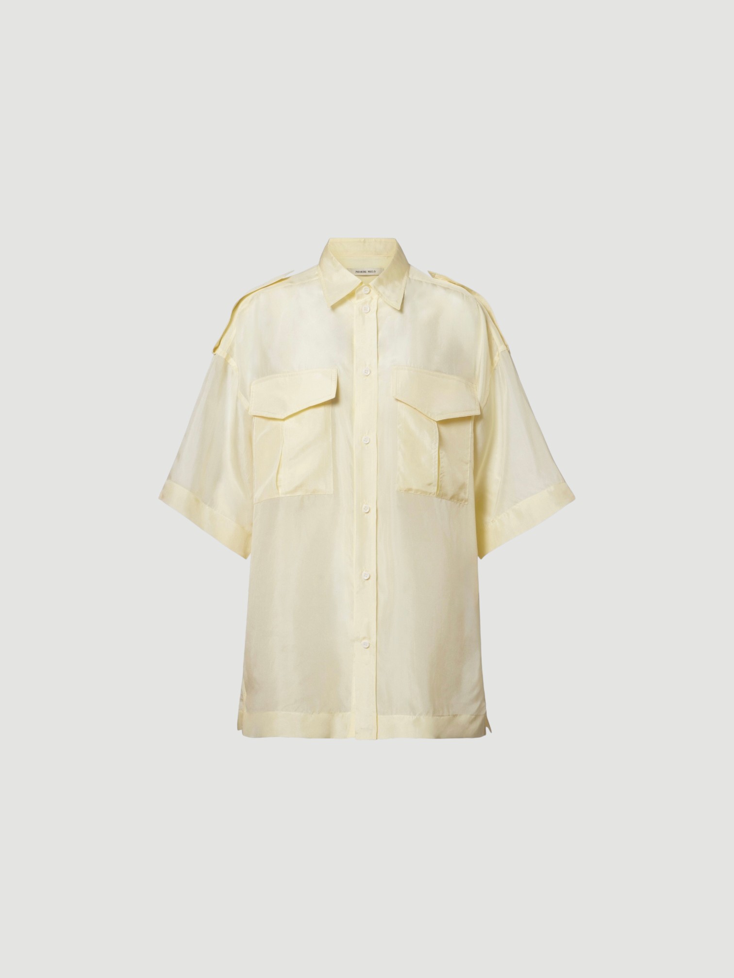 Phoebe Philo Silk Shirt in white, worn with Phoebe Philo Wide-Leg Jeans, Phoebe Philo Peak Sunglasses, Bottega Veneta Sampieri Flat Thong, Phoebe Philo Small Stud Cabas Tote Bag, on the water. Styled by Sharon Lombardo for FDV Concierge.