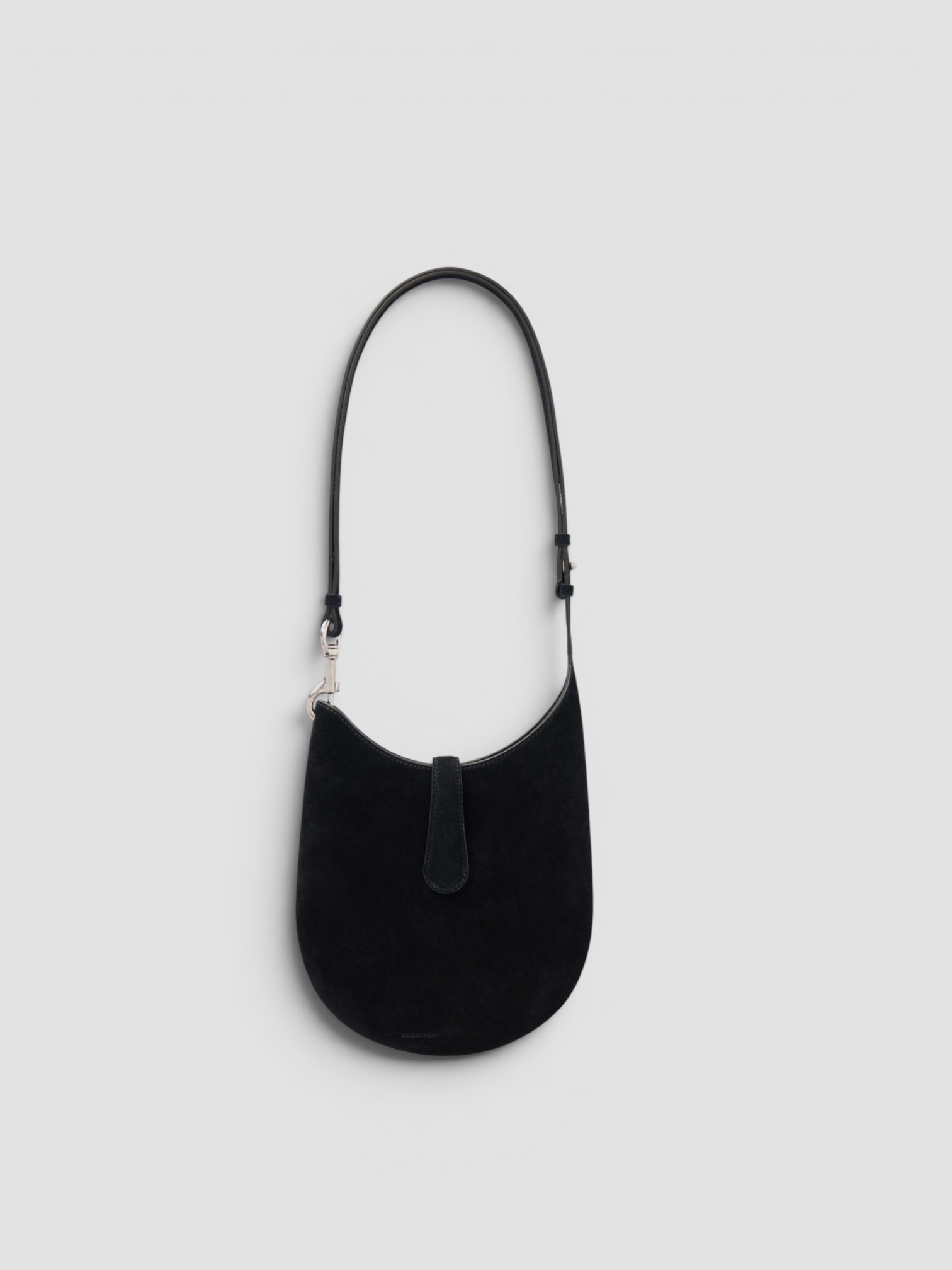 Phoebe Philo Bean Sling Mini Suede Shoulder Bag in black, worn with St. Agni Relaxed Tee Dress. Styled by Sharon Lombardo for FDV Concierge.