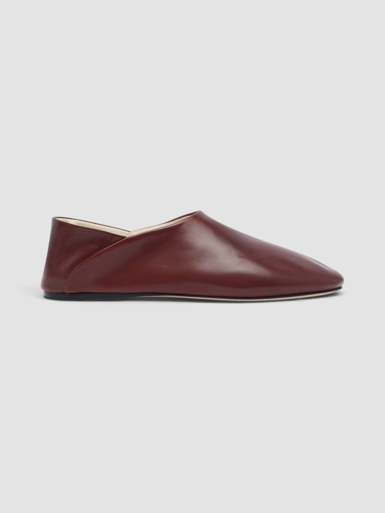 Phoebe Philo Leather Slip-on Shoes in brown.