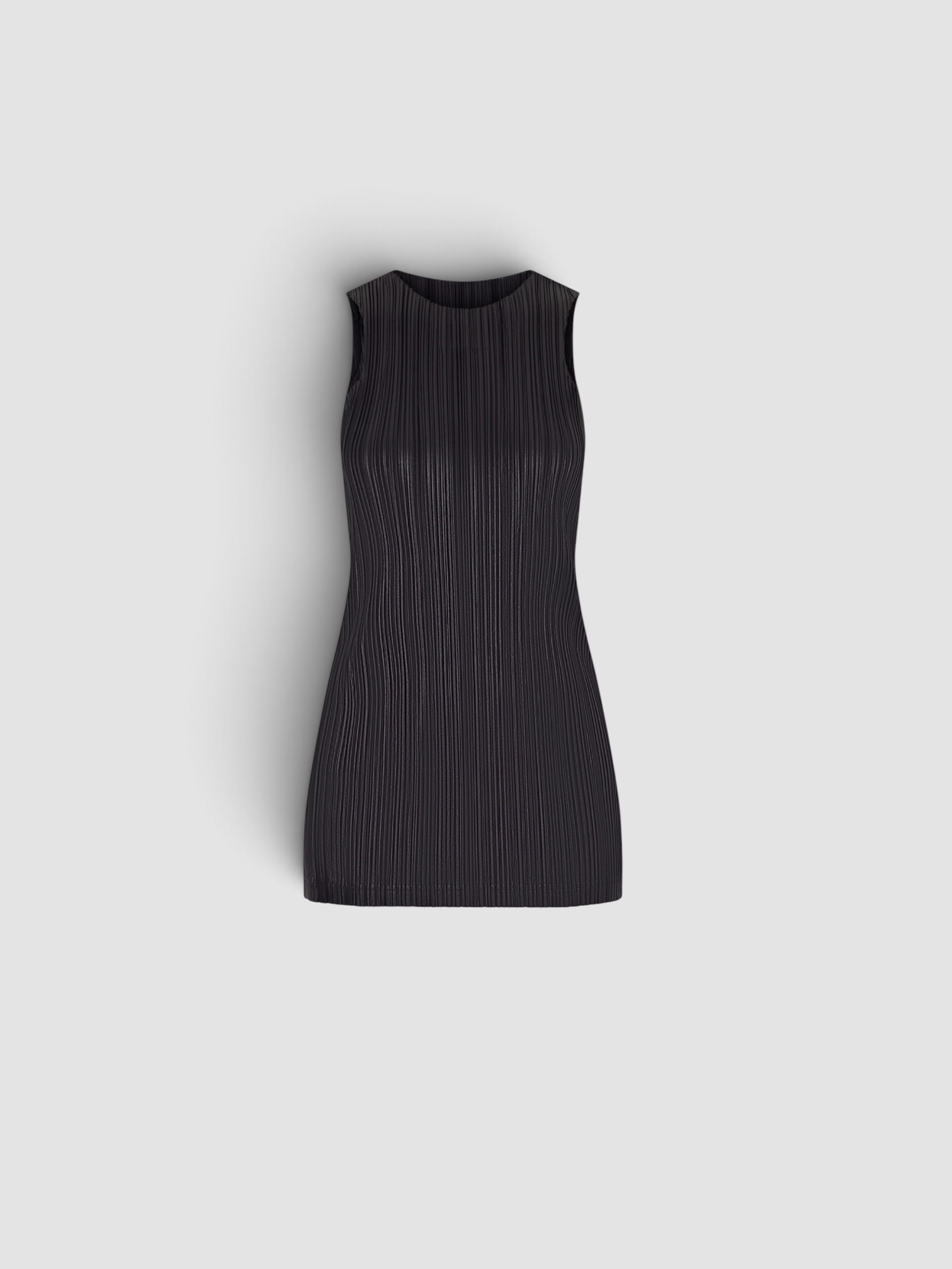 Phoebe Philo Razor Pleated Tank in black, worn with Phoebe Philo Razor Pleated Straight-Leg Pants. Styled by Sharon Lombardo for FDV Concierge.