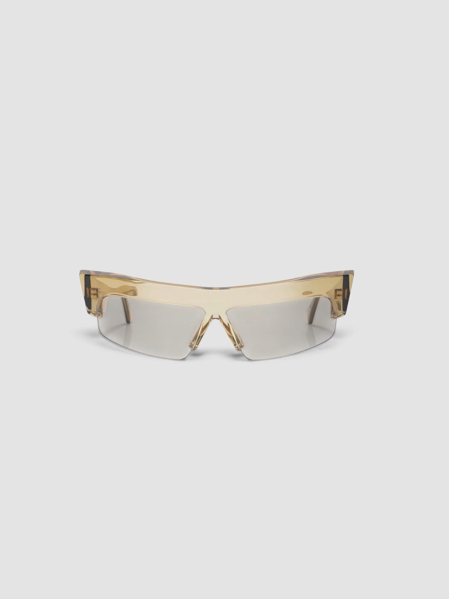 Phoebe Philo Sliced Cruise Rectangular Sunglasses in champagne.