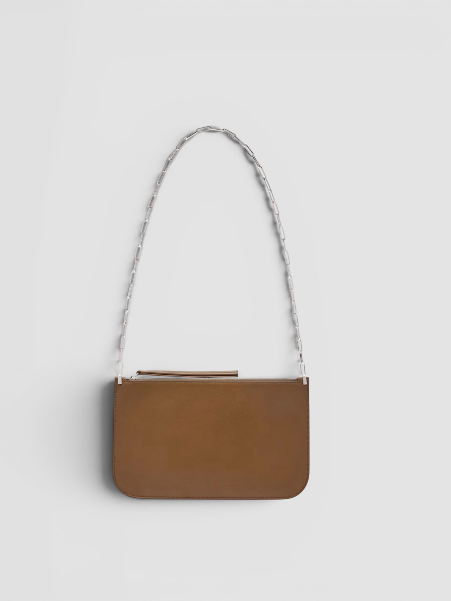 Phoebe Philo Slip Leather Pouch in khaki silver, worn with St. Agni Relaxed Tee Dress. Styled by Sharon Lombardo for FDV Concierge.