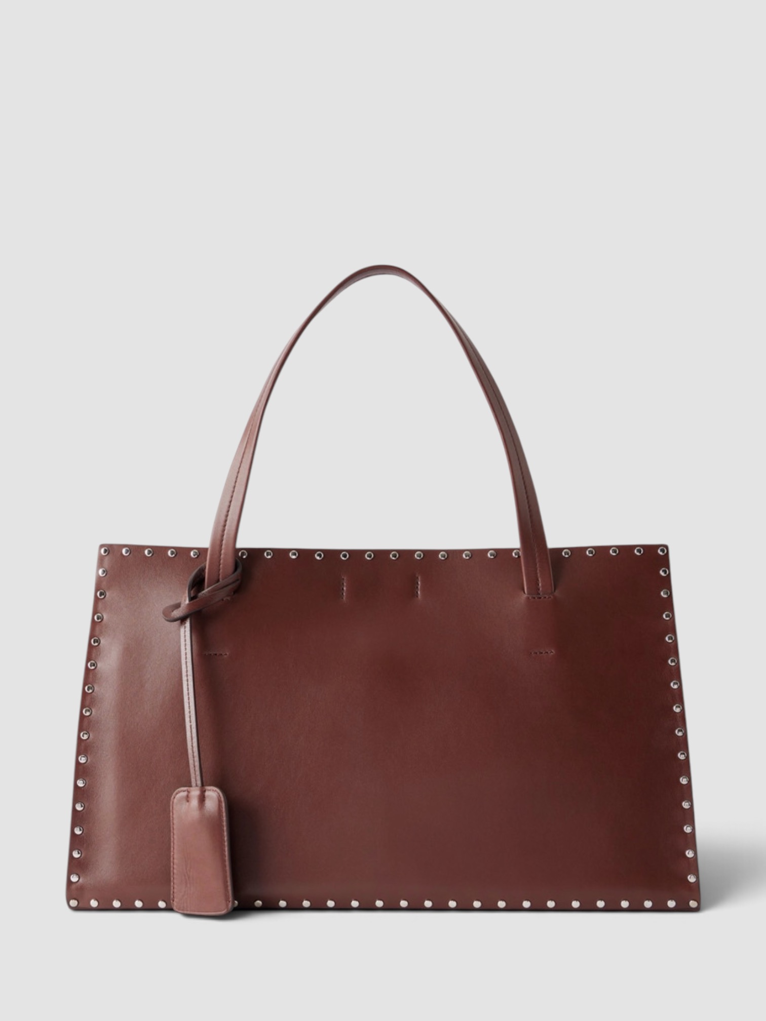 Phoebe Philo Small Stud Cabas Tote Bag in oxblood, worn with Nili Lotan Della Lace Maxi Dress, Phoebe Philo Frizz Flip Flop, Phoebe Philo Gold Studded Hoops, Phoebe Philo Peak Sunglasses, walking the city. Styled by Sharon Lombardo for FDV Concierge.