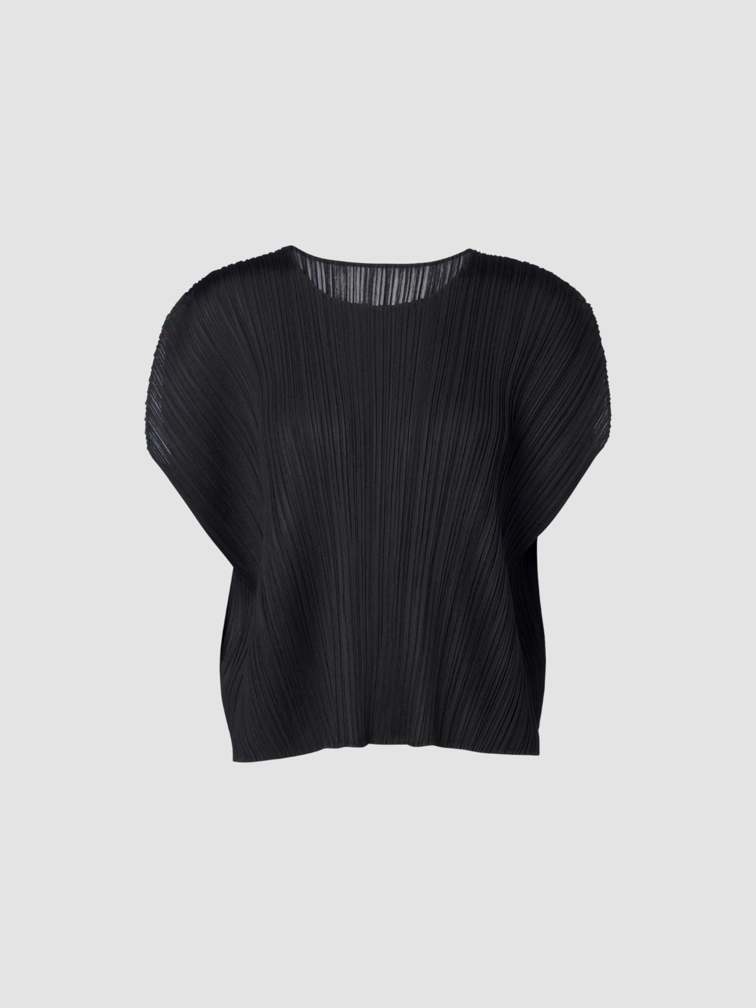 Pleats Please Issey Miyake Monthly Colors: July Pleated Top in black. Styled by Sharon Lombardo for FDV Concierge.