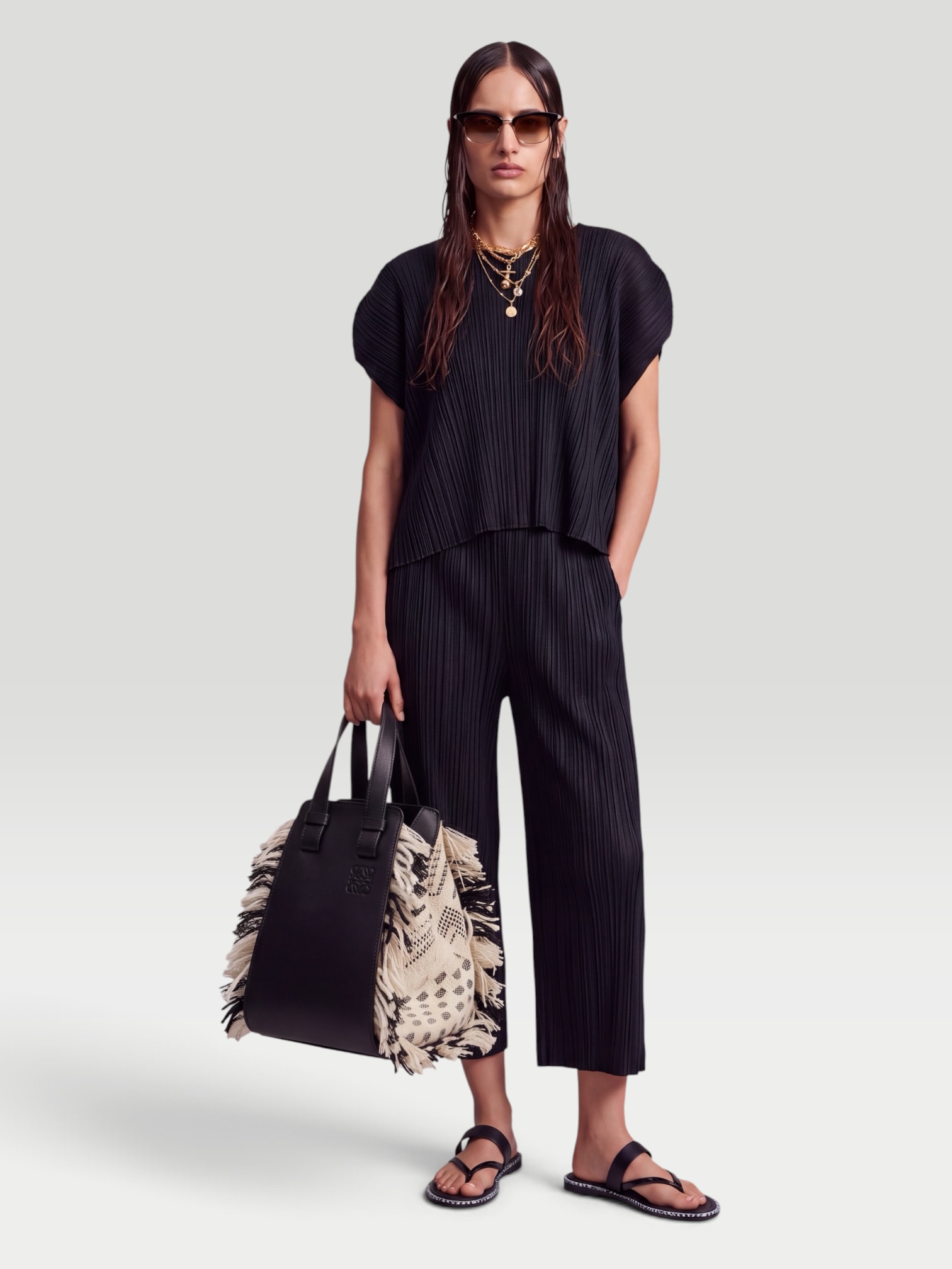 Pleats Please Issey Miyake Monthly Colors: July Pleated Top in black. Styled by Sharon Lombardo for FDV Concierge.
