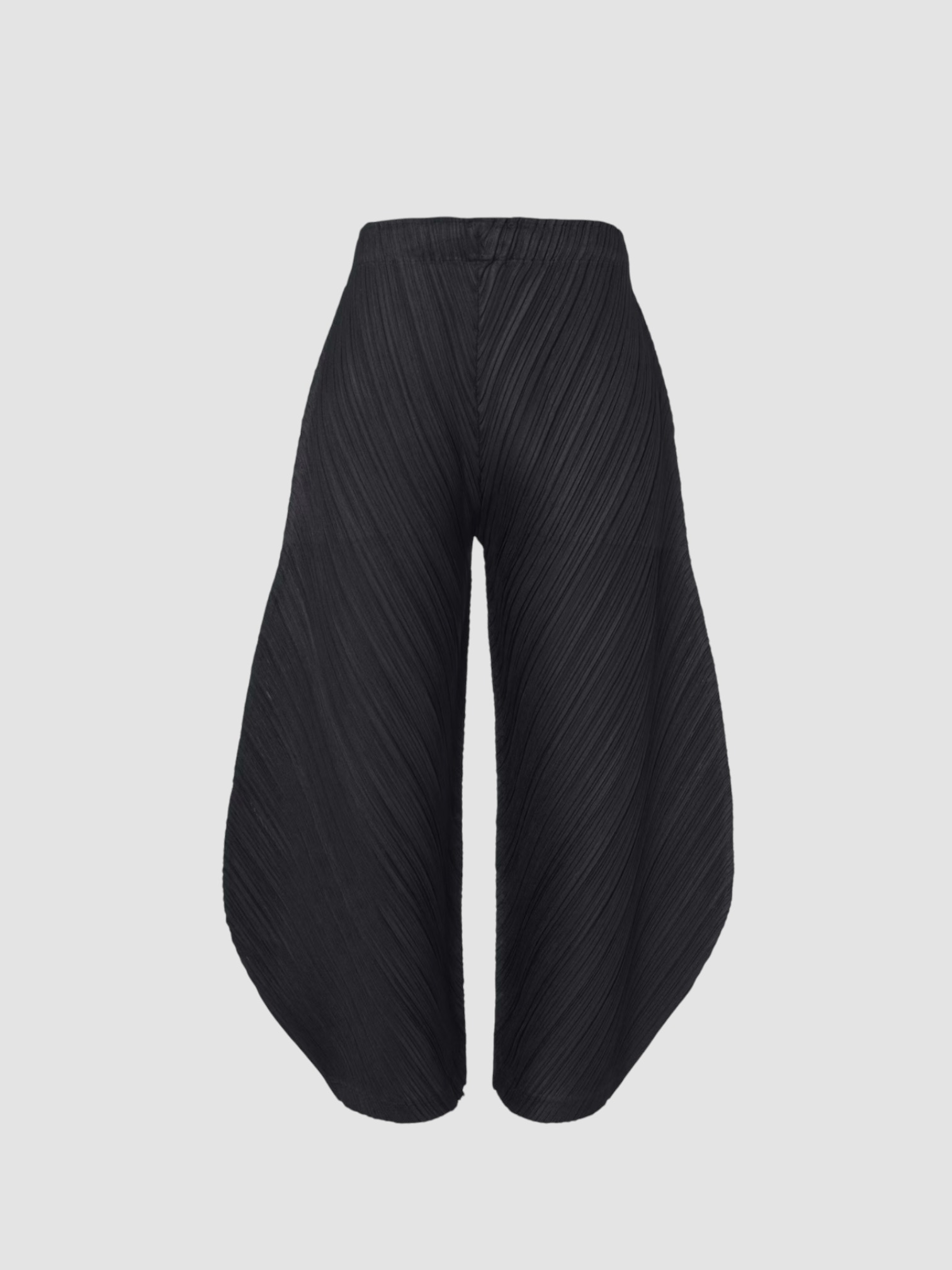 Pleats Please Issey Miyake Monthly Colors: July Pleated Barrel-Leg Pants in black. Styled by Sharon Lombardo for FDV Concierge.