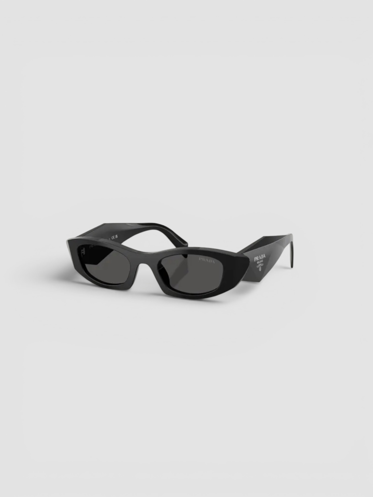 Prada B16SF Acetate Oval Sunglasses in black, worn with St. Agni Soft Jersey Slim Scoop Tank, Phoebe Philo Straight Jeans, Phoebe Philo Cone Heel Mules, Phoebe Philo 25mm Leather Belt, the evening. Styled by Sharon Lombardo for FDV Concierge.