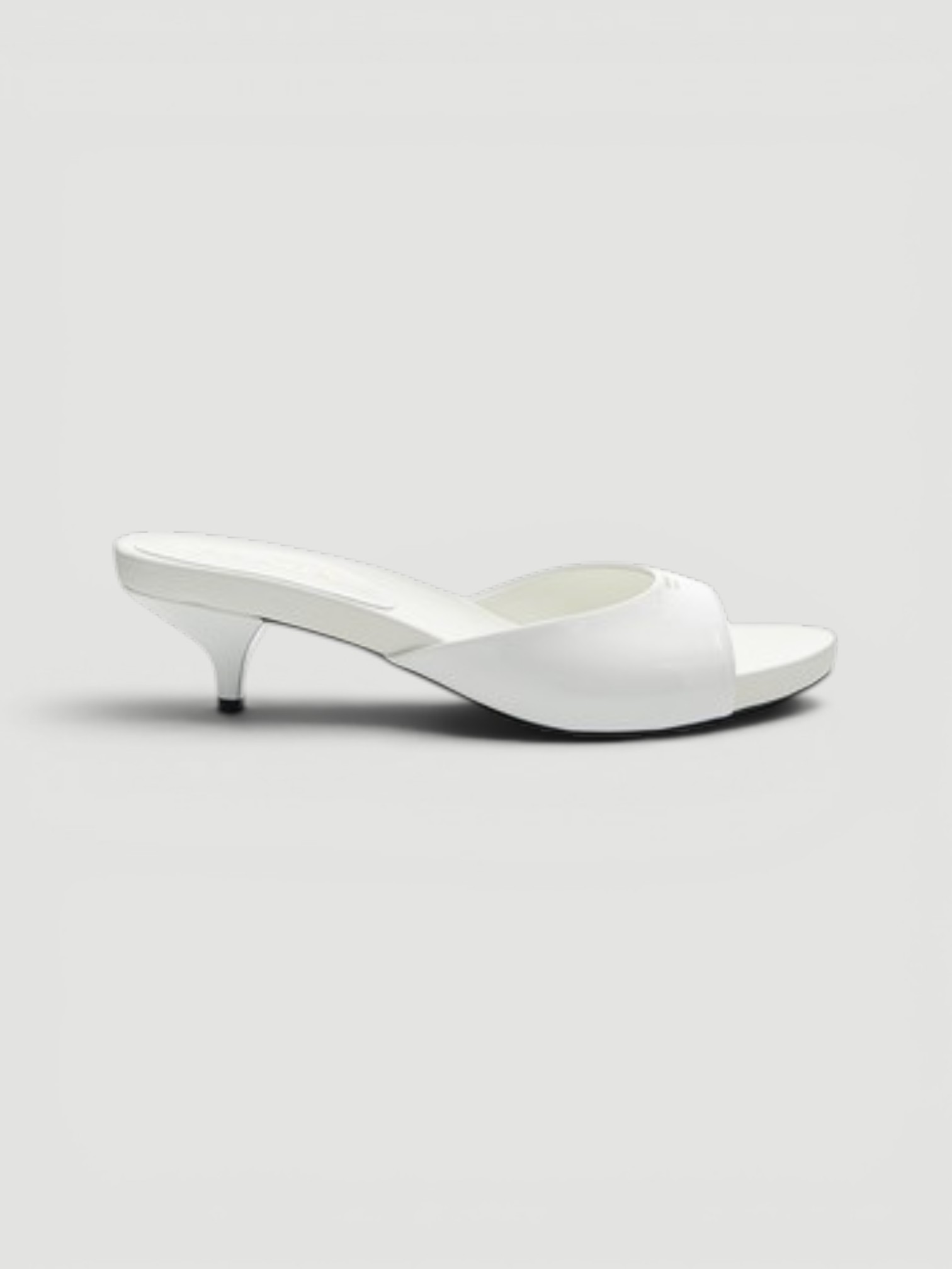 Prada Leather Sandals in white.