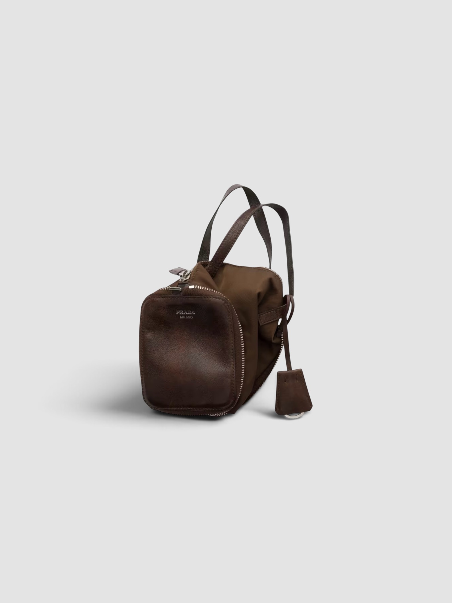 Prada Mini Re-Nylon and Leather Foldable Duffle Bag in cocoa, worn with St. Agni Relaxed Tee Dress. Styled by Sharon Lombardo for FDV Concierge.
