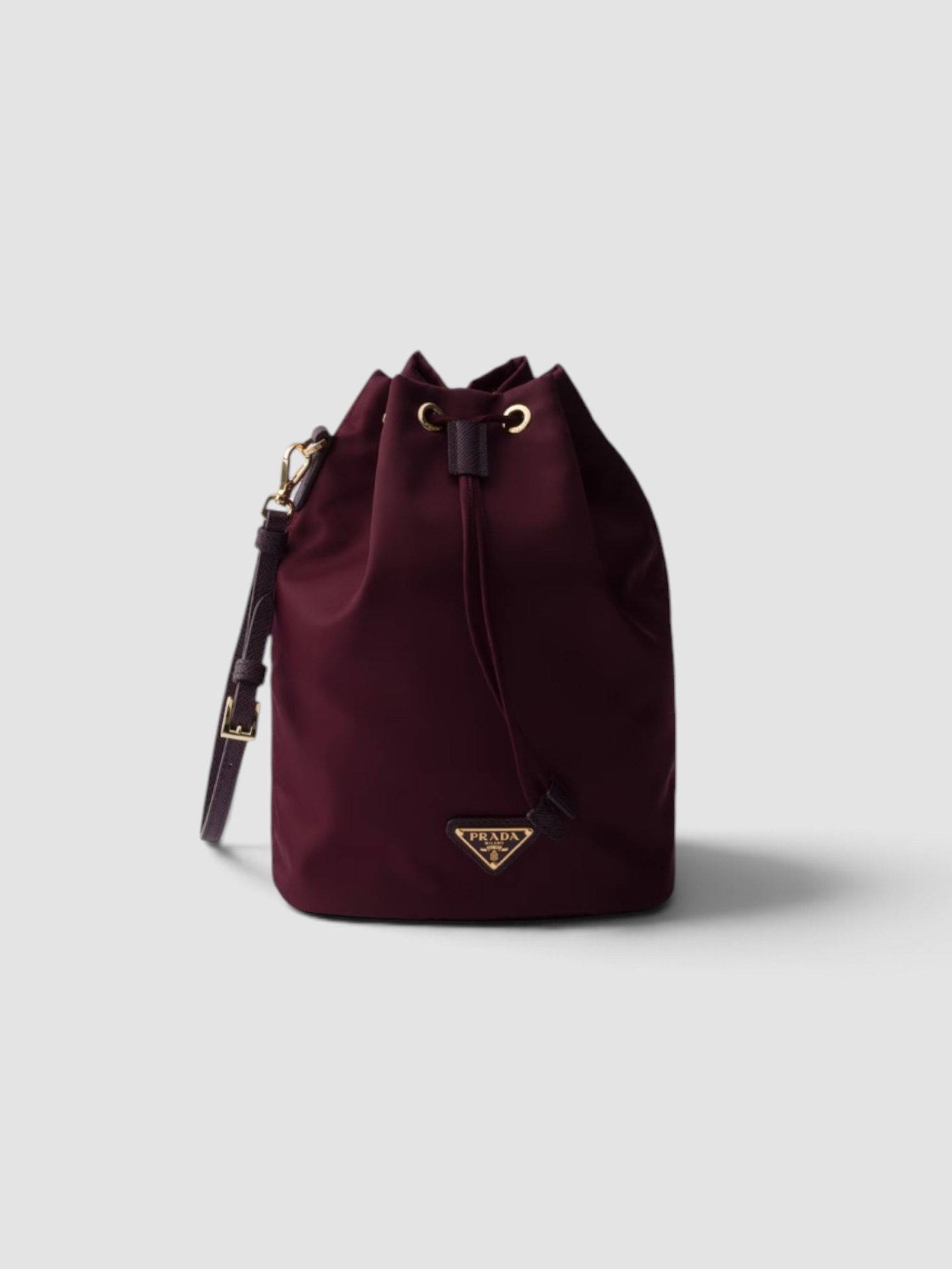 Prada Re-Nylon Pouch in burgundy.