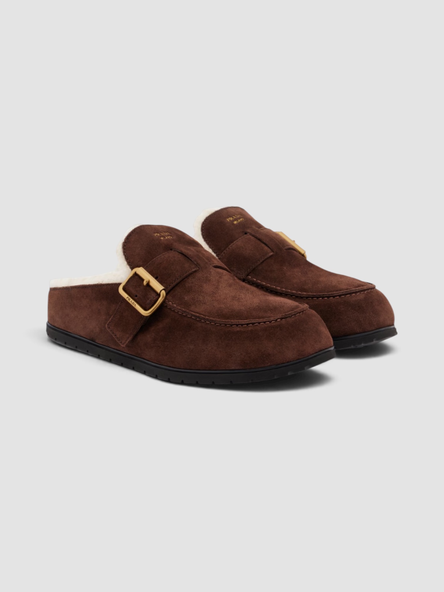 Prada Shearling-Lined Suede Mules in moro.