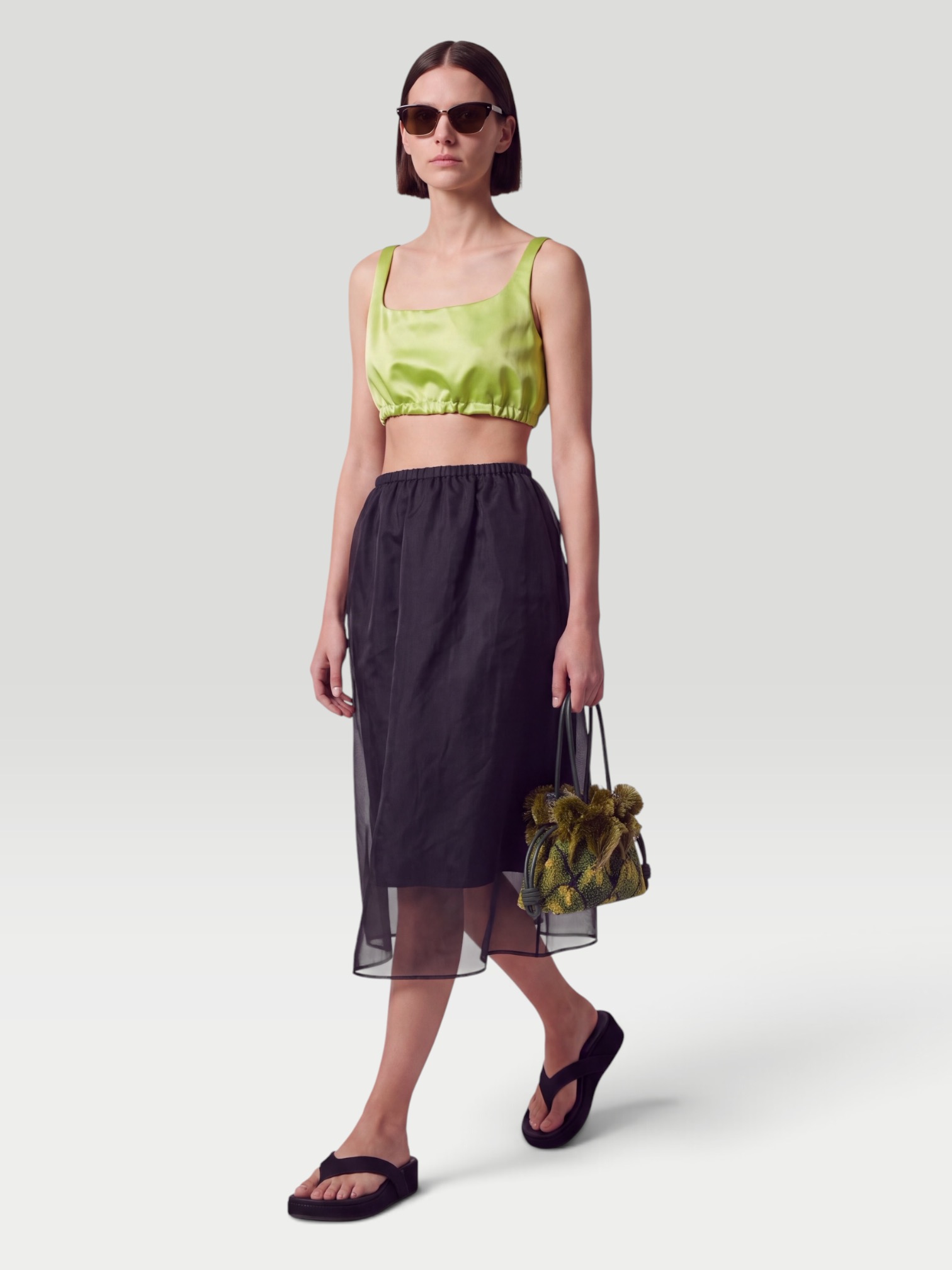 Prada Silk Satin Midi Skirt in black. Styled by Sharon Lombardo for FDV Concierge.