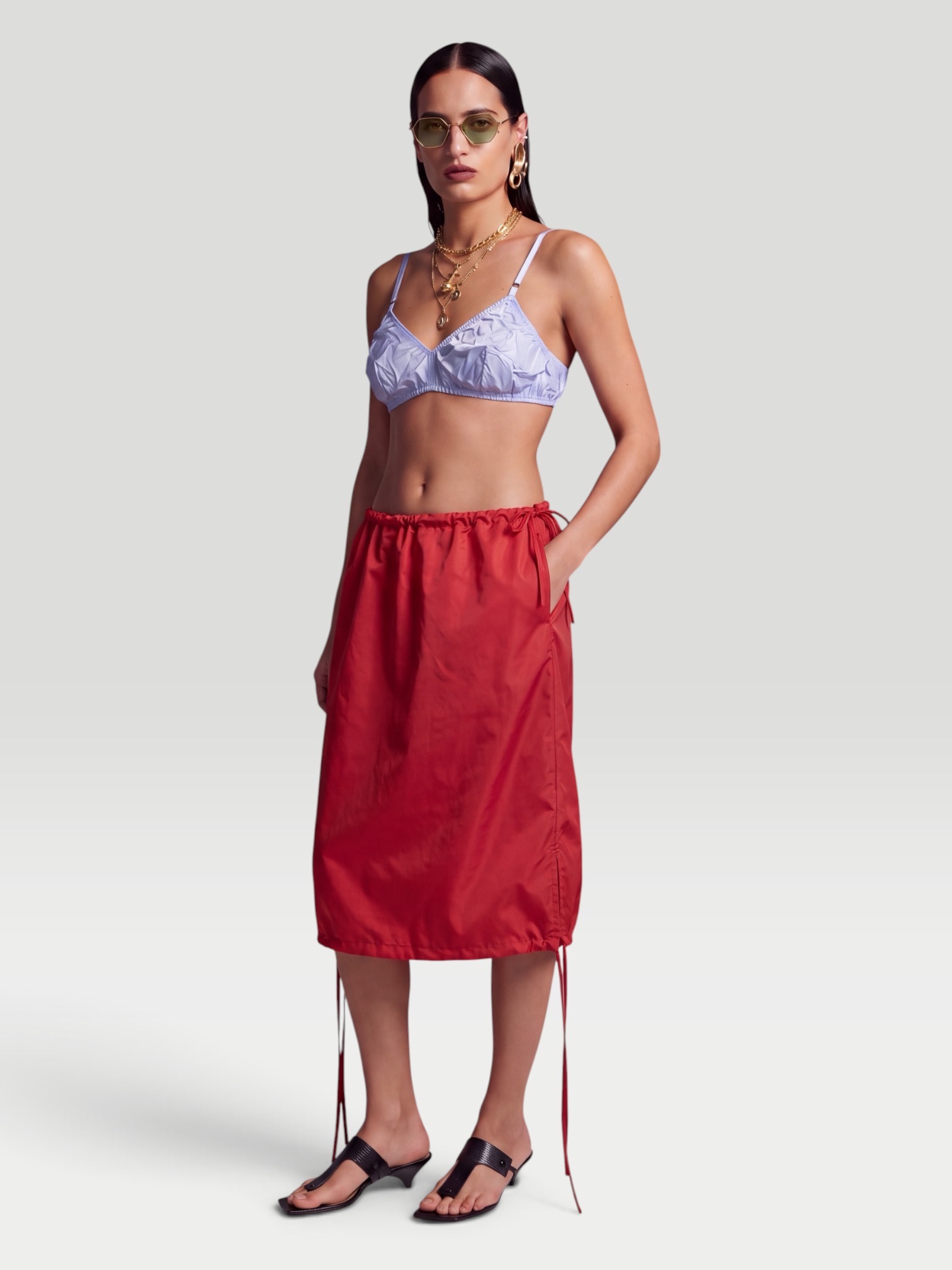 Prada Silk Satin Midi Skirt in red.