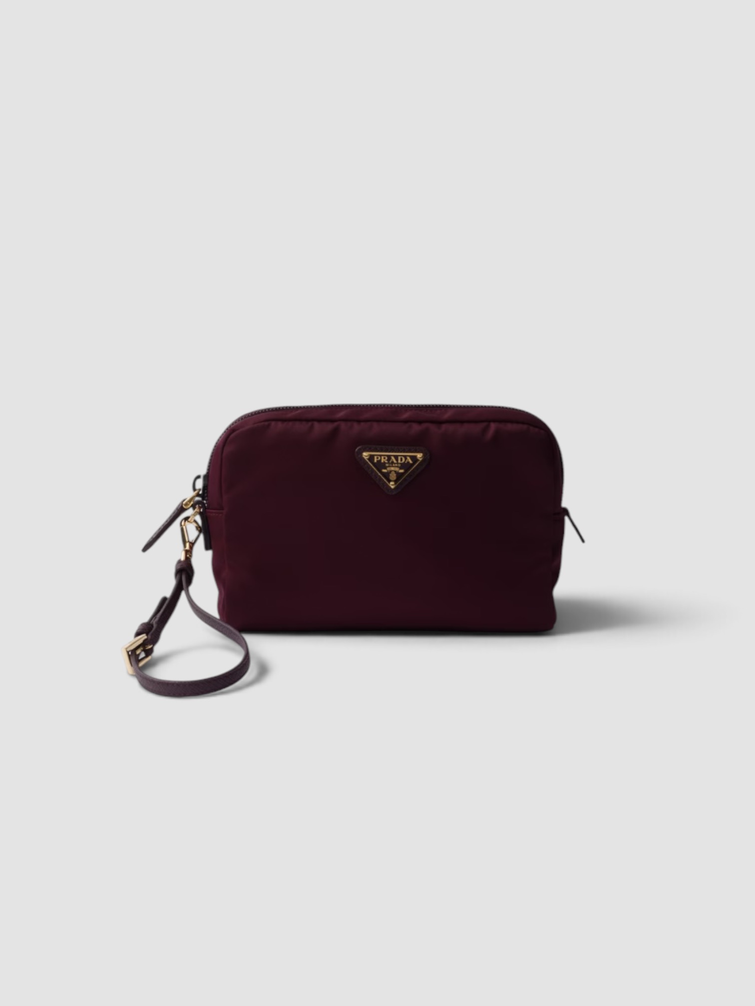 Prada Small Re-Nylon Pouch in burgundy.